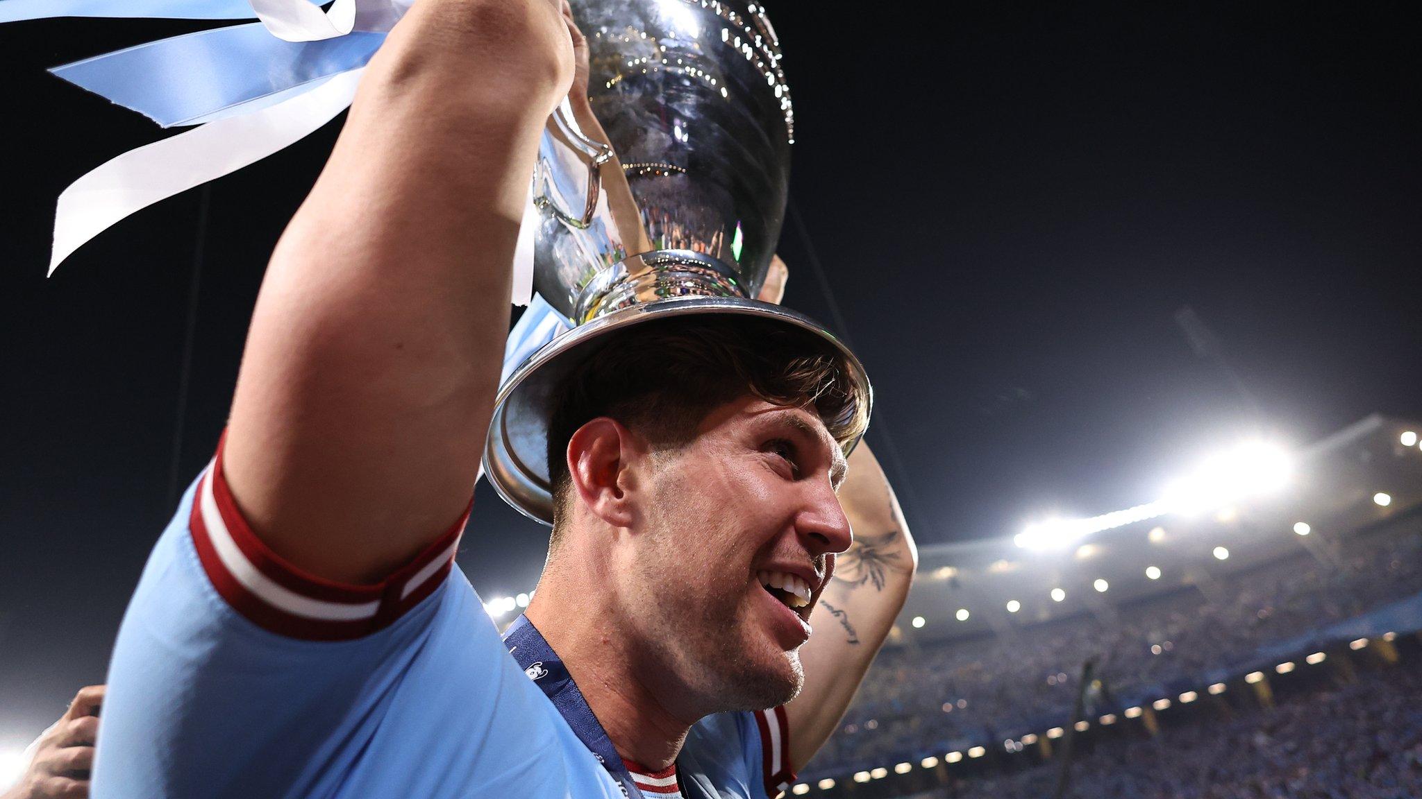 John Stones with the trophy