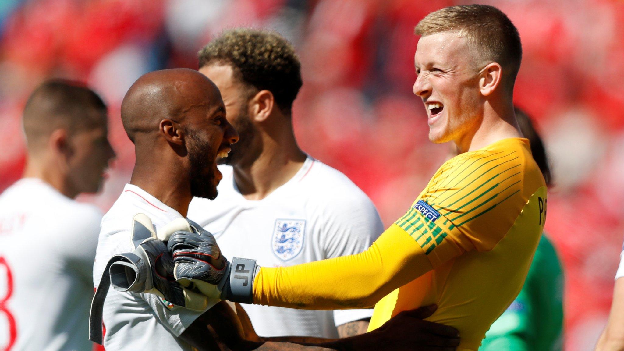 Fabian Delph and Jordan Pickford celebrate