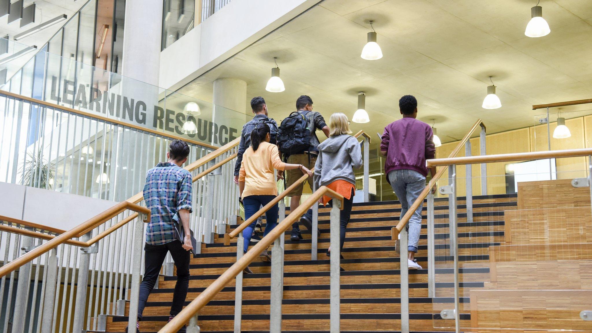 Students going up stairs