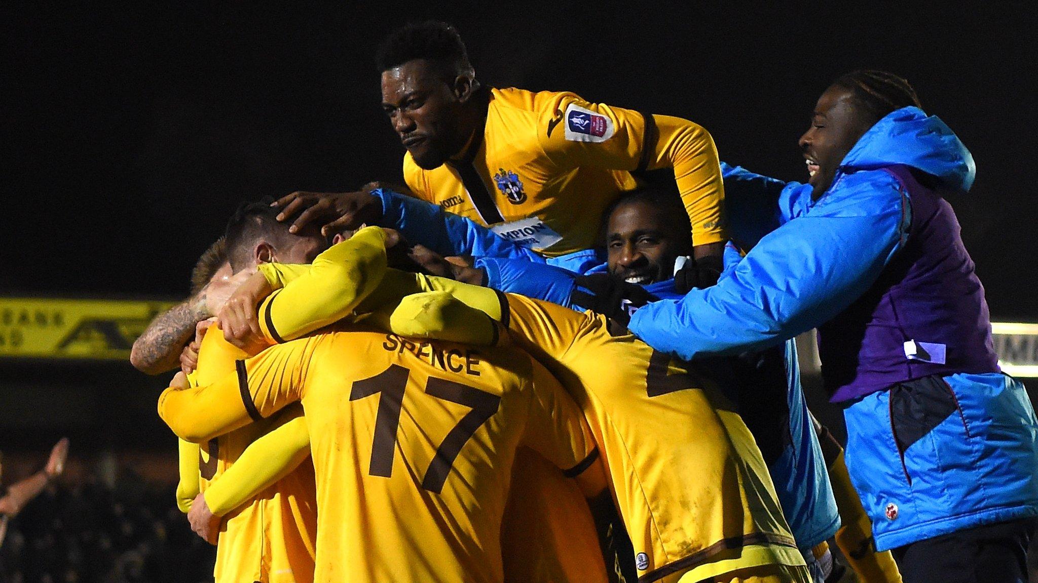 Sutton celebrate winning against Wimbledon