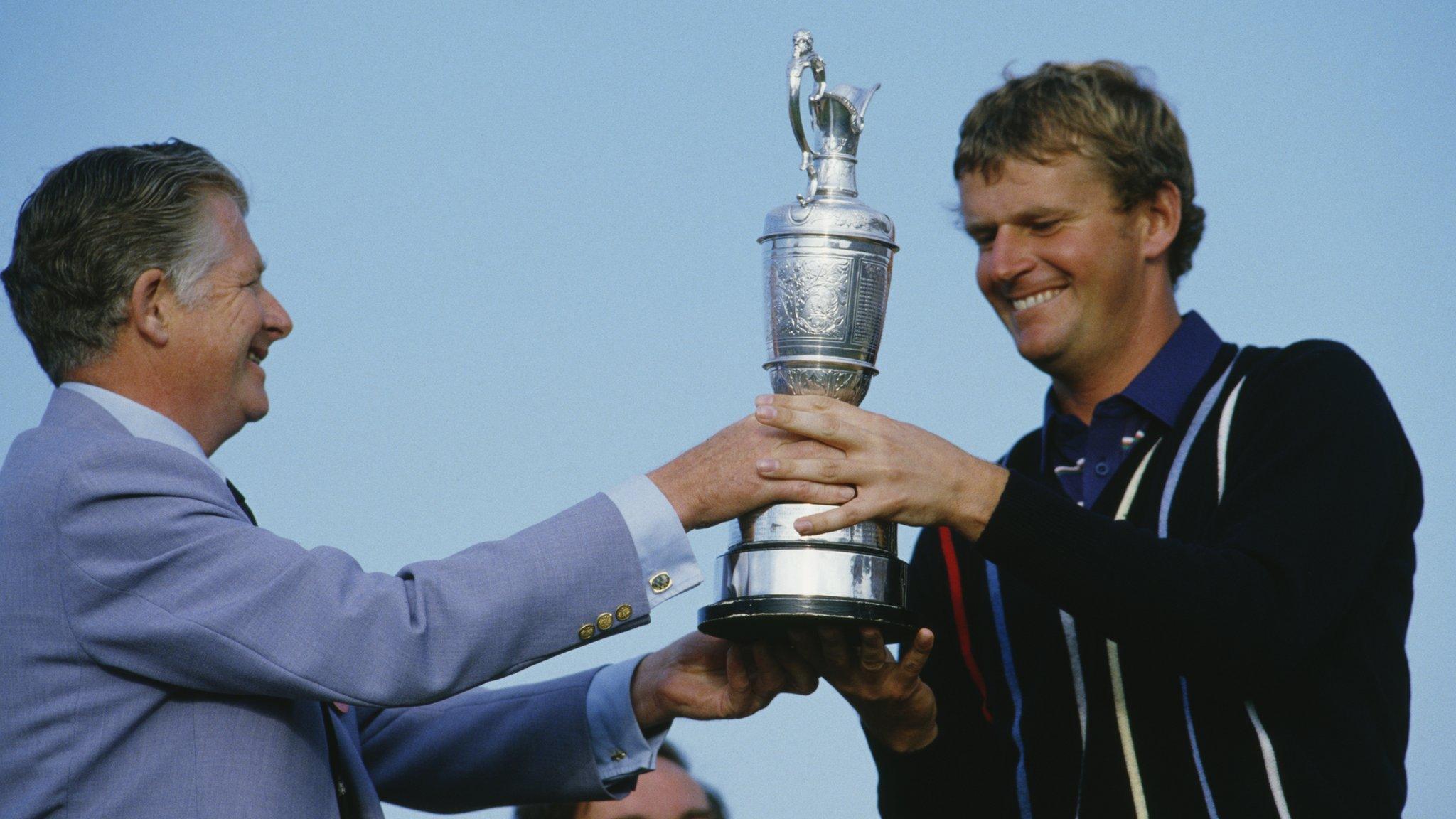 Sandy Lyle receives the Claret Jug after winning the Open in 1985