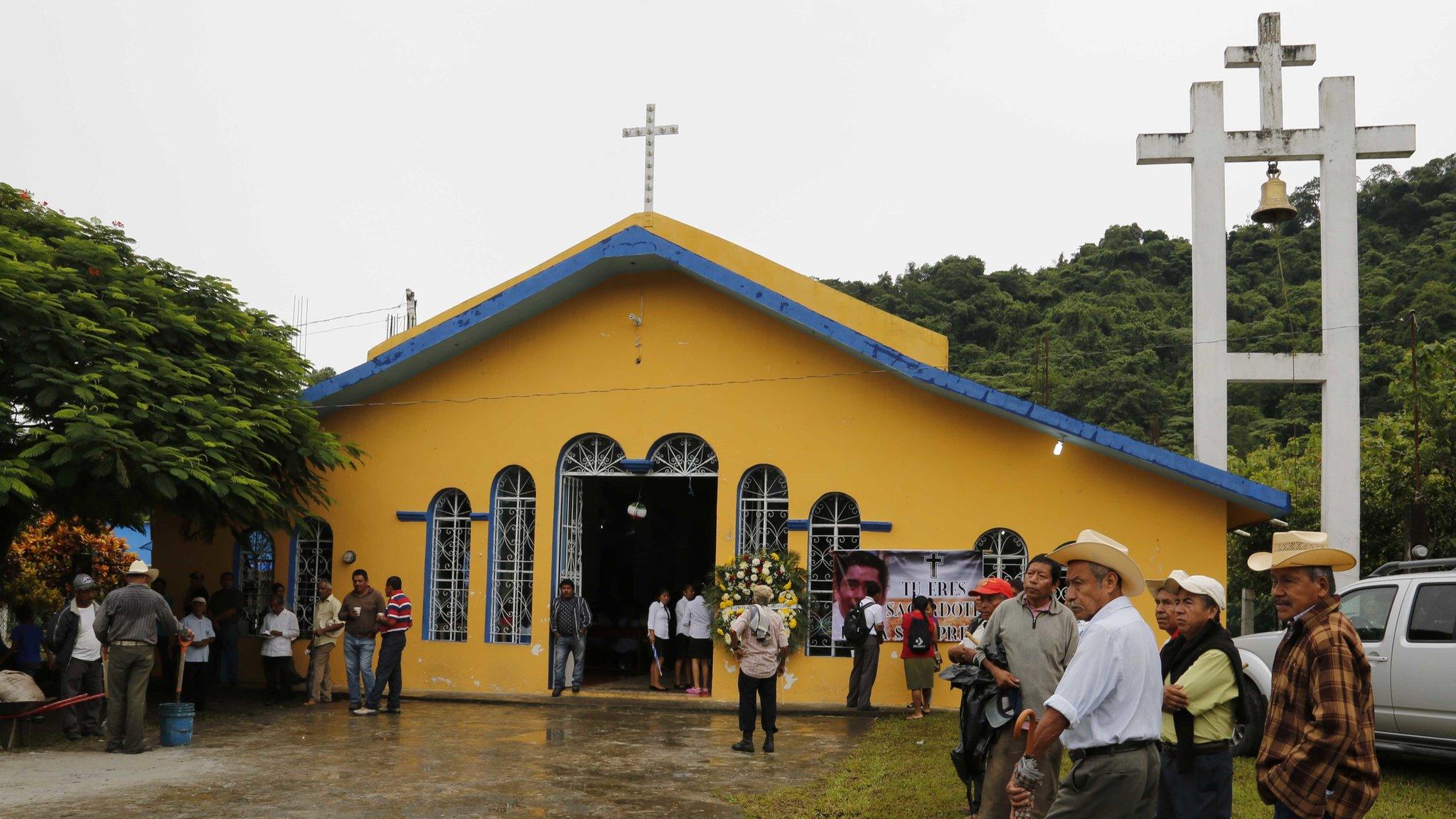 People gather at Our Lady of Asuncion Church in Paso Blanco, Veracruz state, Mexico, for funeral Mass in memory of Catholic priest murdered in Veracruz. 21 Sept 2016