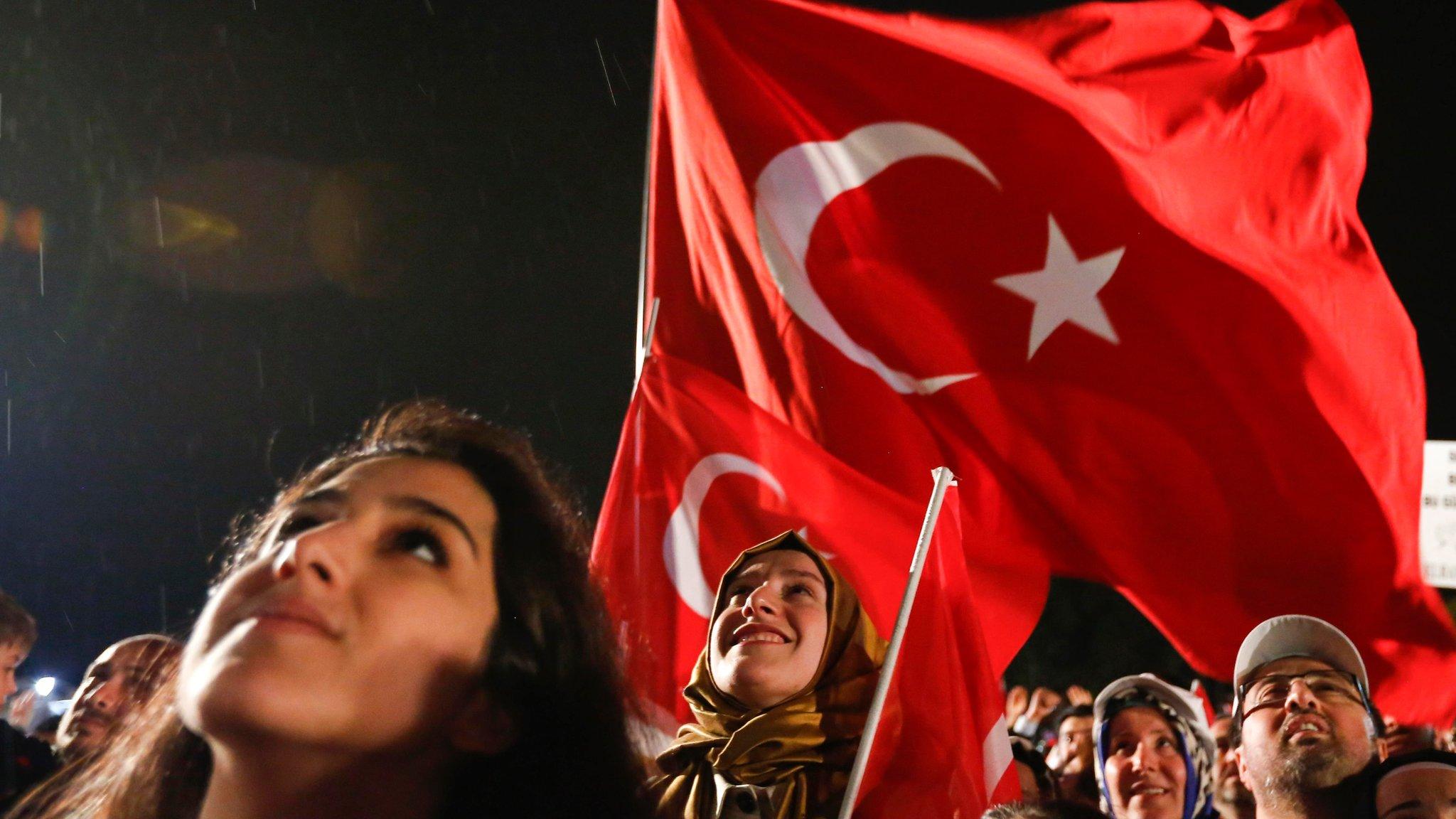 Supporters of Turkish President Tayyip Erdogan celebrate in Istanbul, 16 April