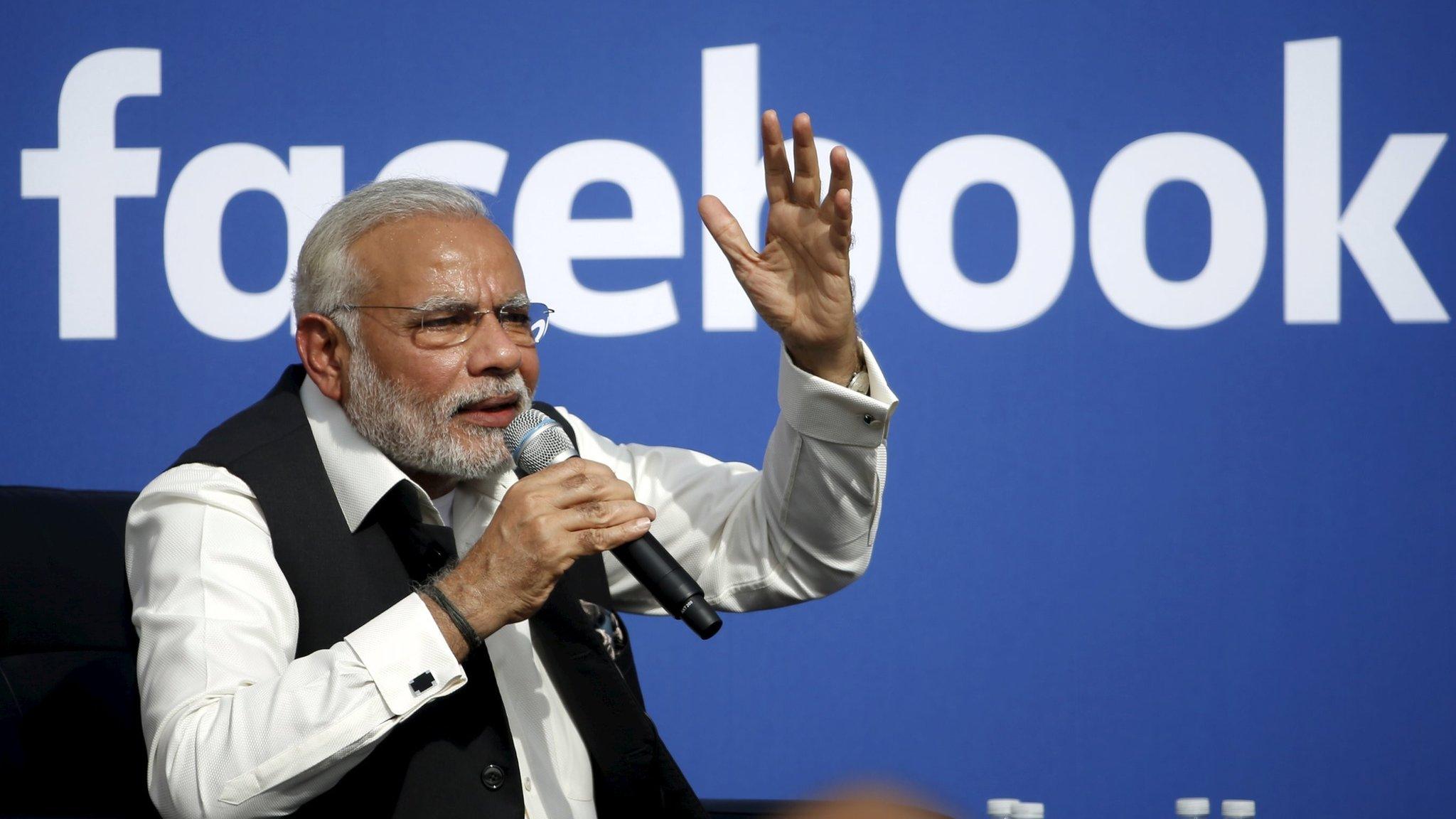 Mr Modi gestures while speaking at the session