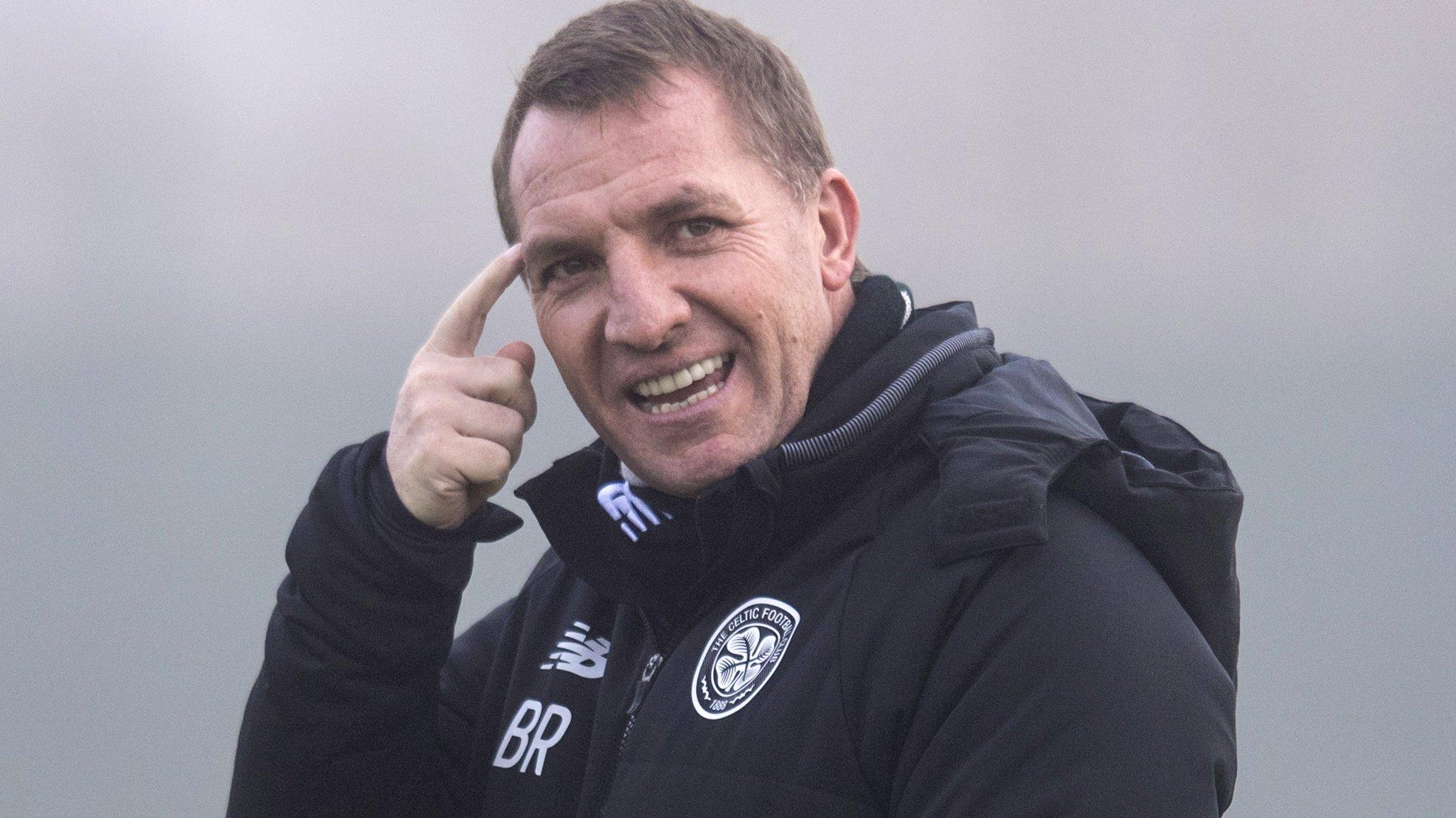 Brendan Rodgers makes a point to his players at Celtic training