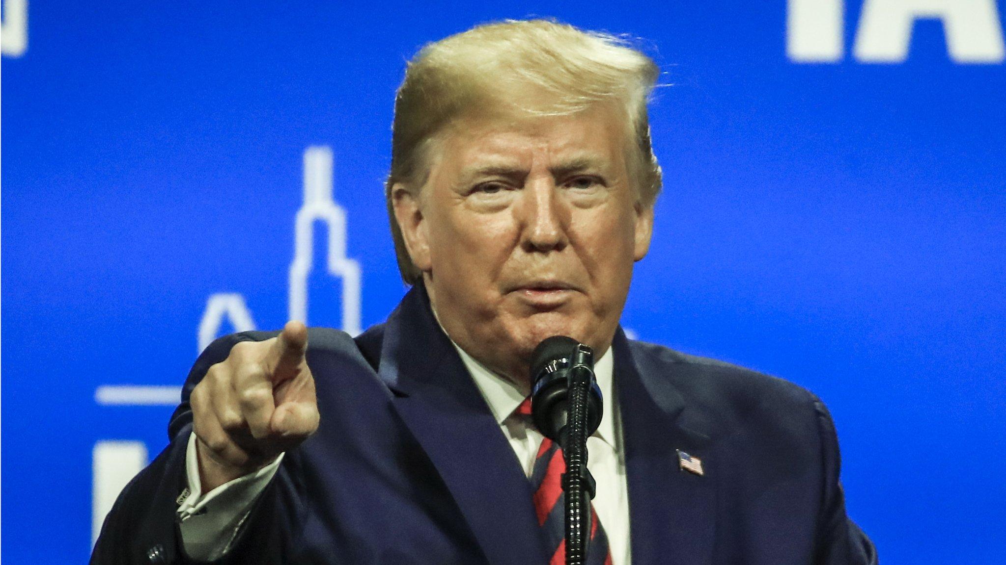 US President Donald Trump addresses the International Association of Chiefs of Police Conference in Chicago, Illinois