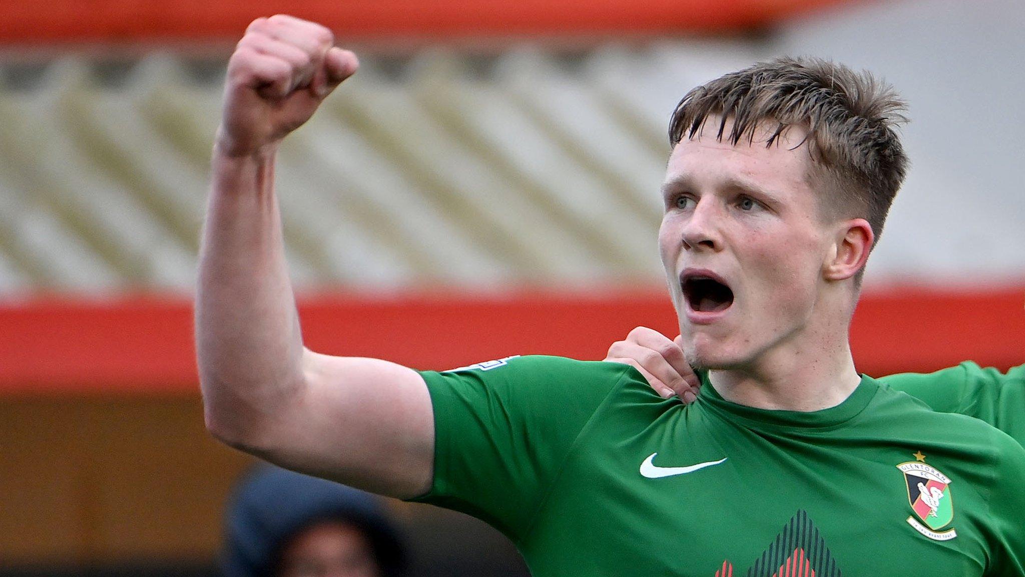 Portsmouth have signed midfielder Terry Devlin from Irish Premiership side Glentoran.