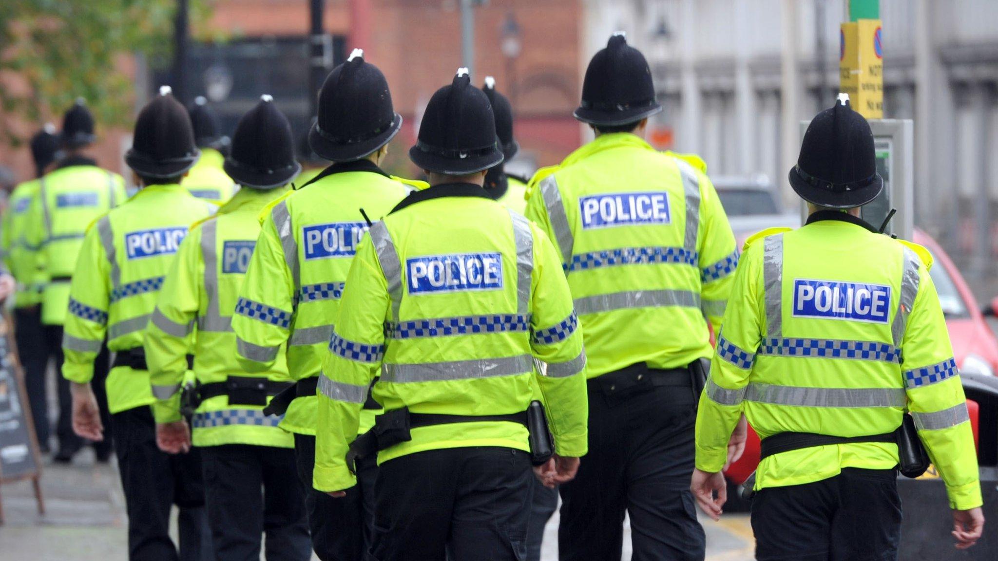 A group of police officers walking