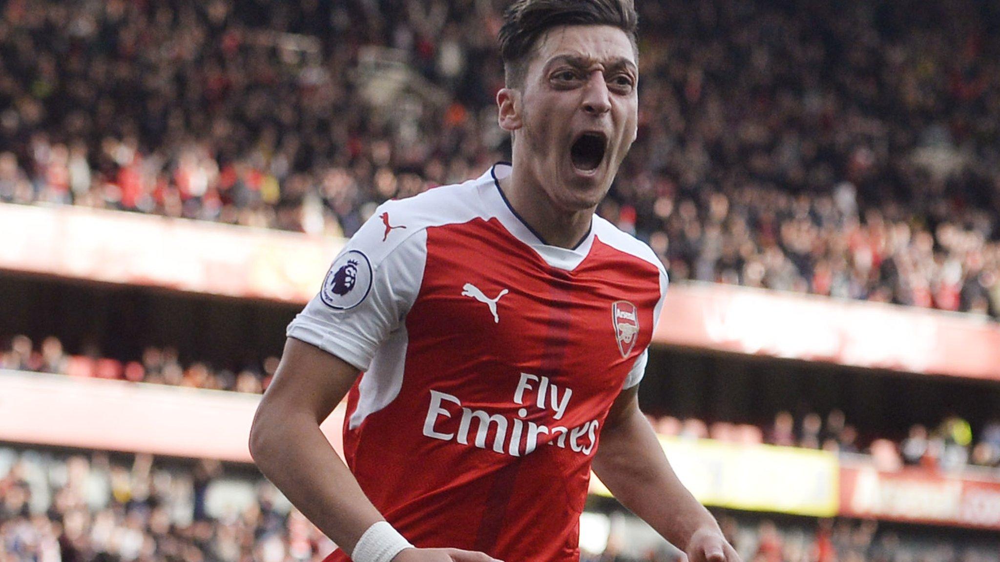 Mesut Ozil celebrates