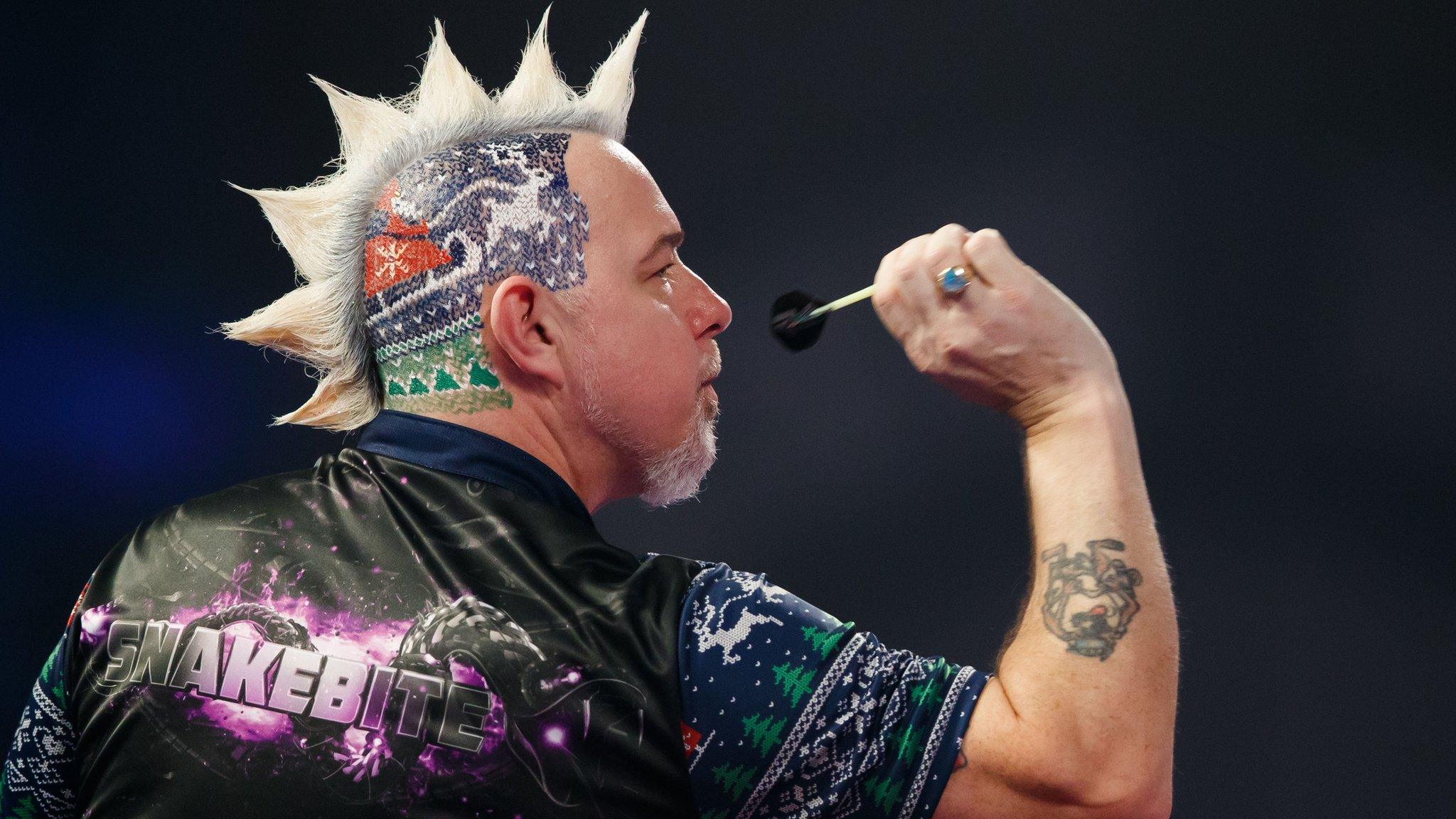 Peter Wright throws a dart at the PDC World Championship