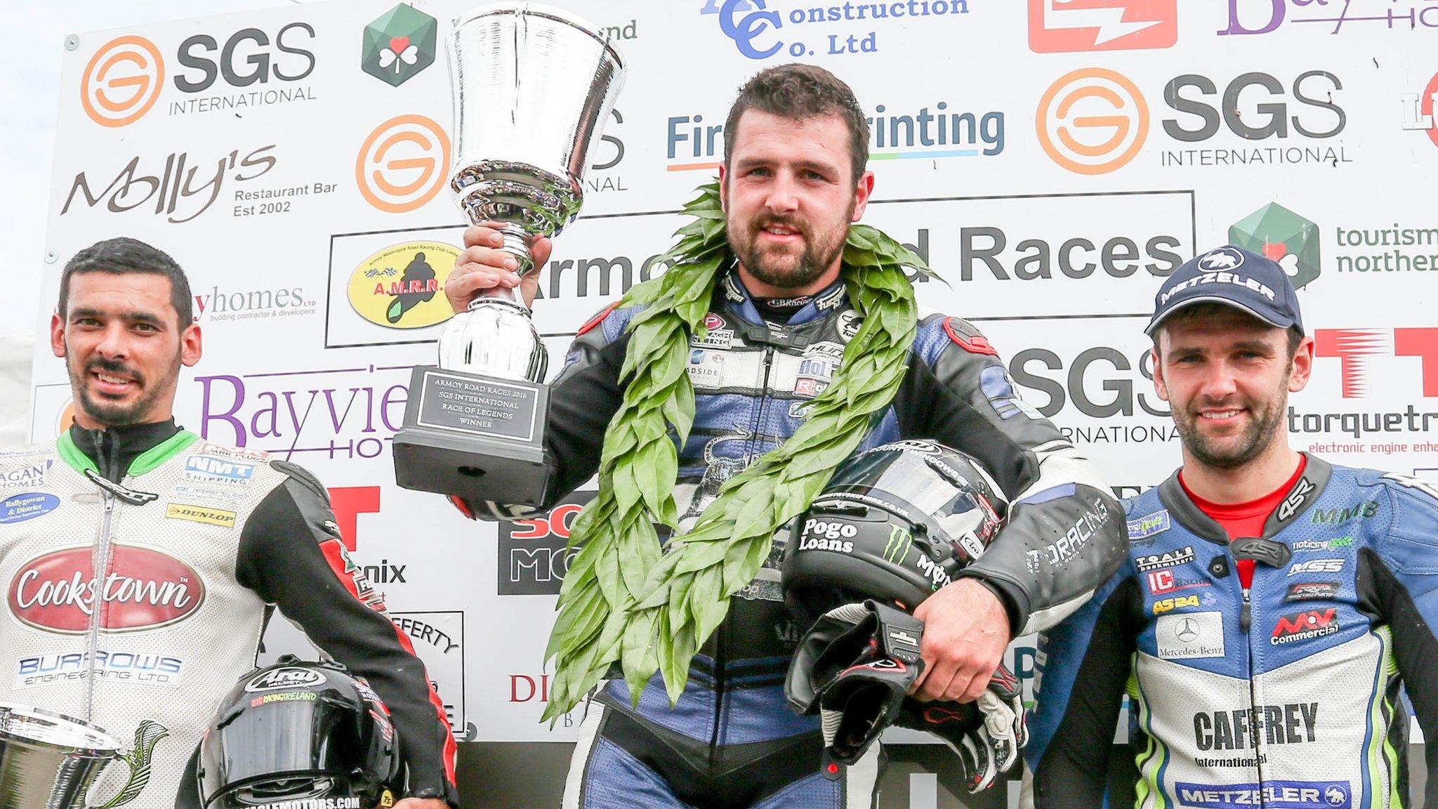 The Race of Legends podium with Derek Sheils, winner Michael Dunlop and William Dunlop