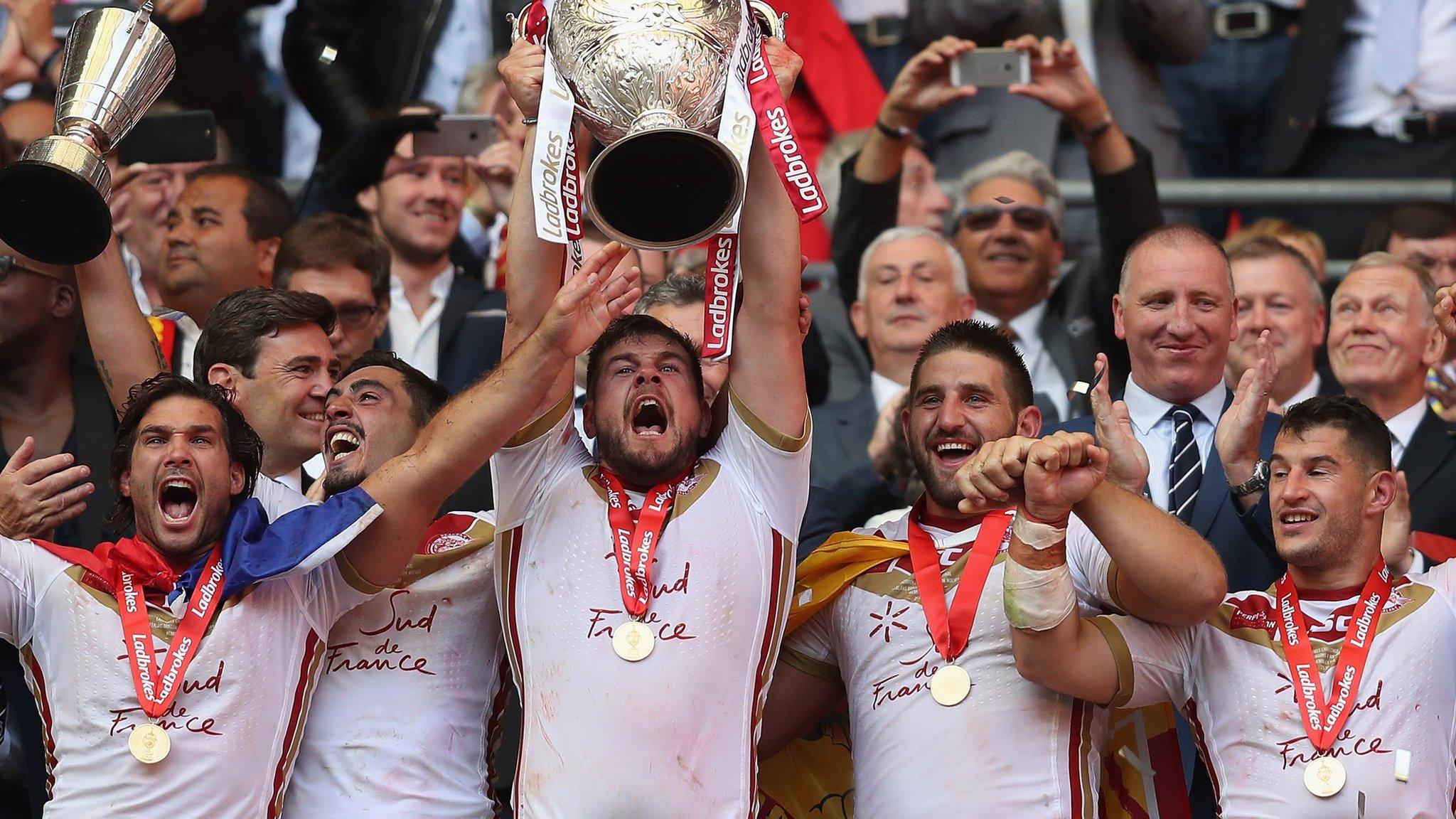 Remi Casty of Catalans Dragons lifts the Challenge Cup