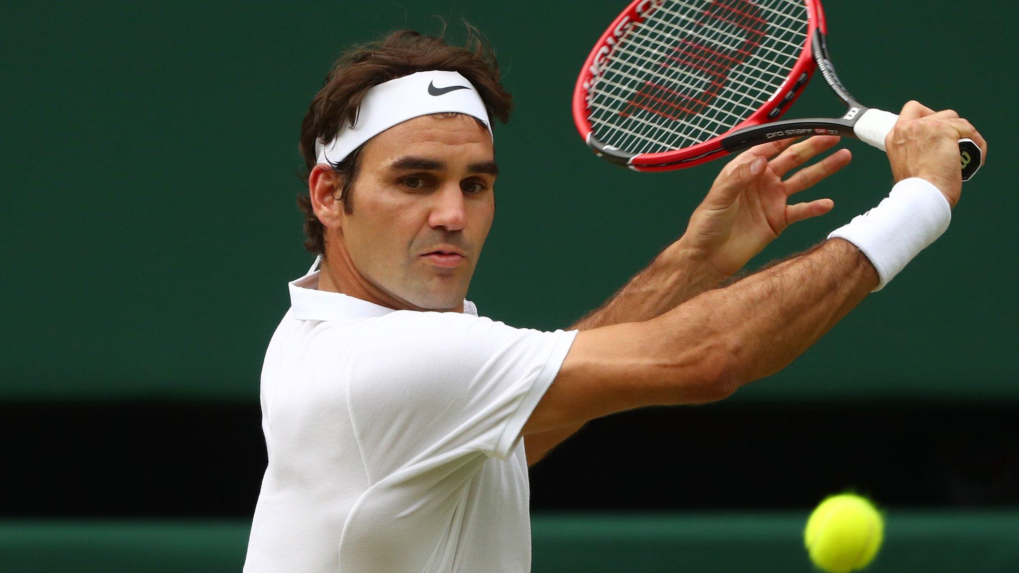 Roger Federer in action at Wimbledon