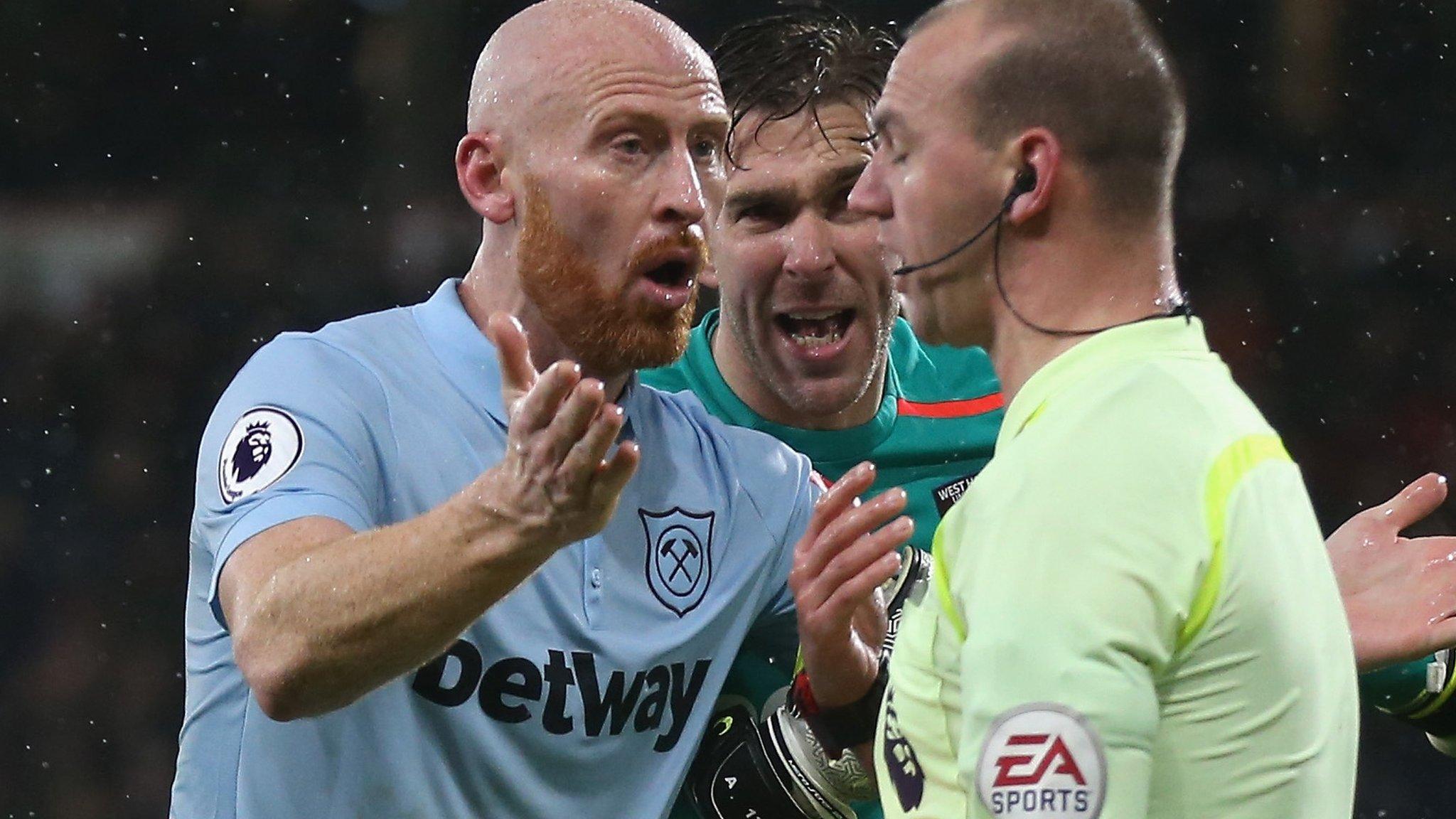 James Collins protests to Bobby Madley after the referee awarded the controversial third goal