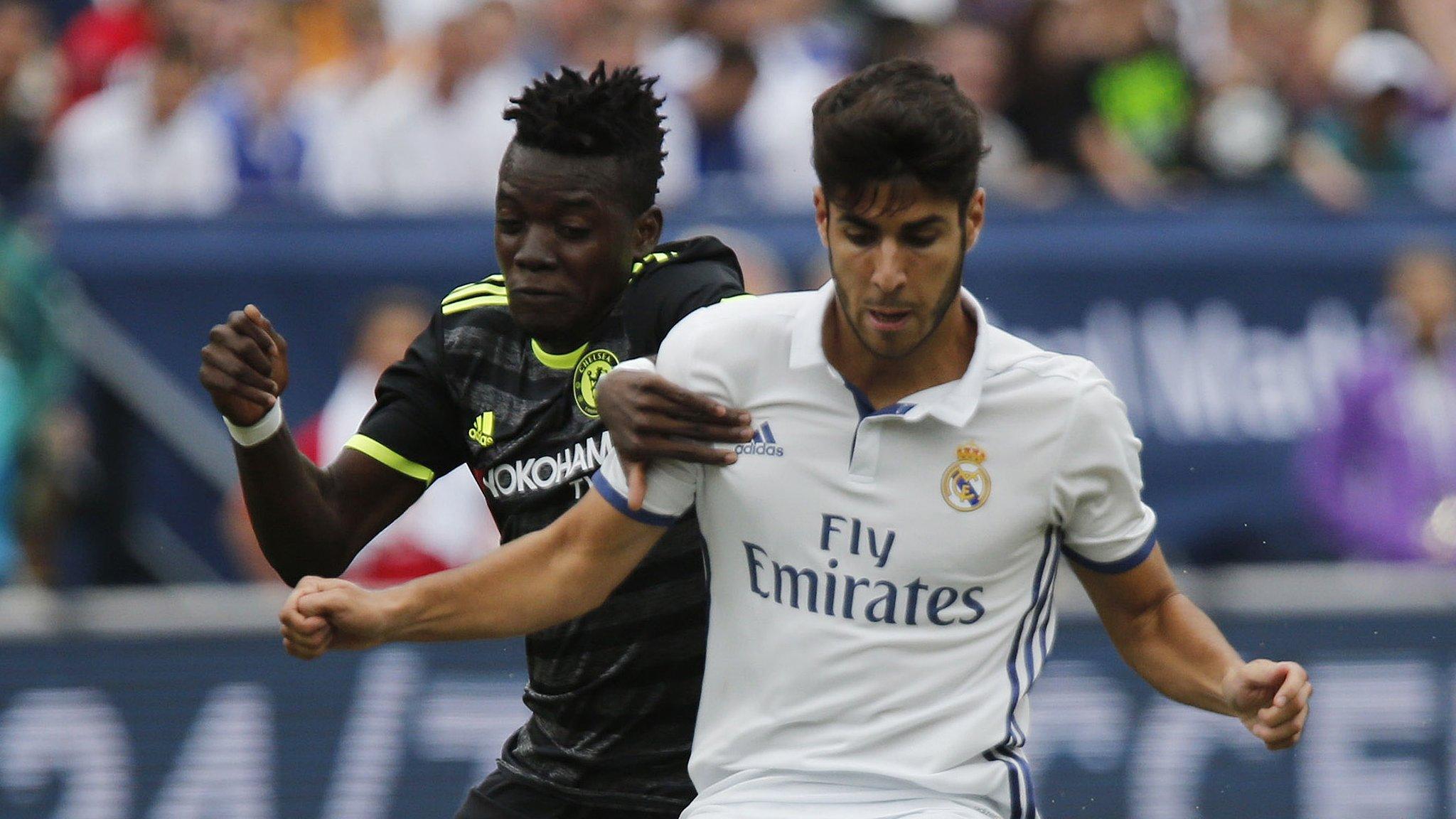 Real Madrid's Marco Asensio and Chelsea's Baba Rahman