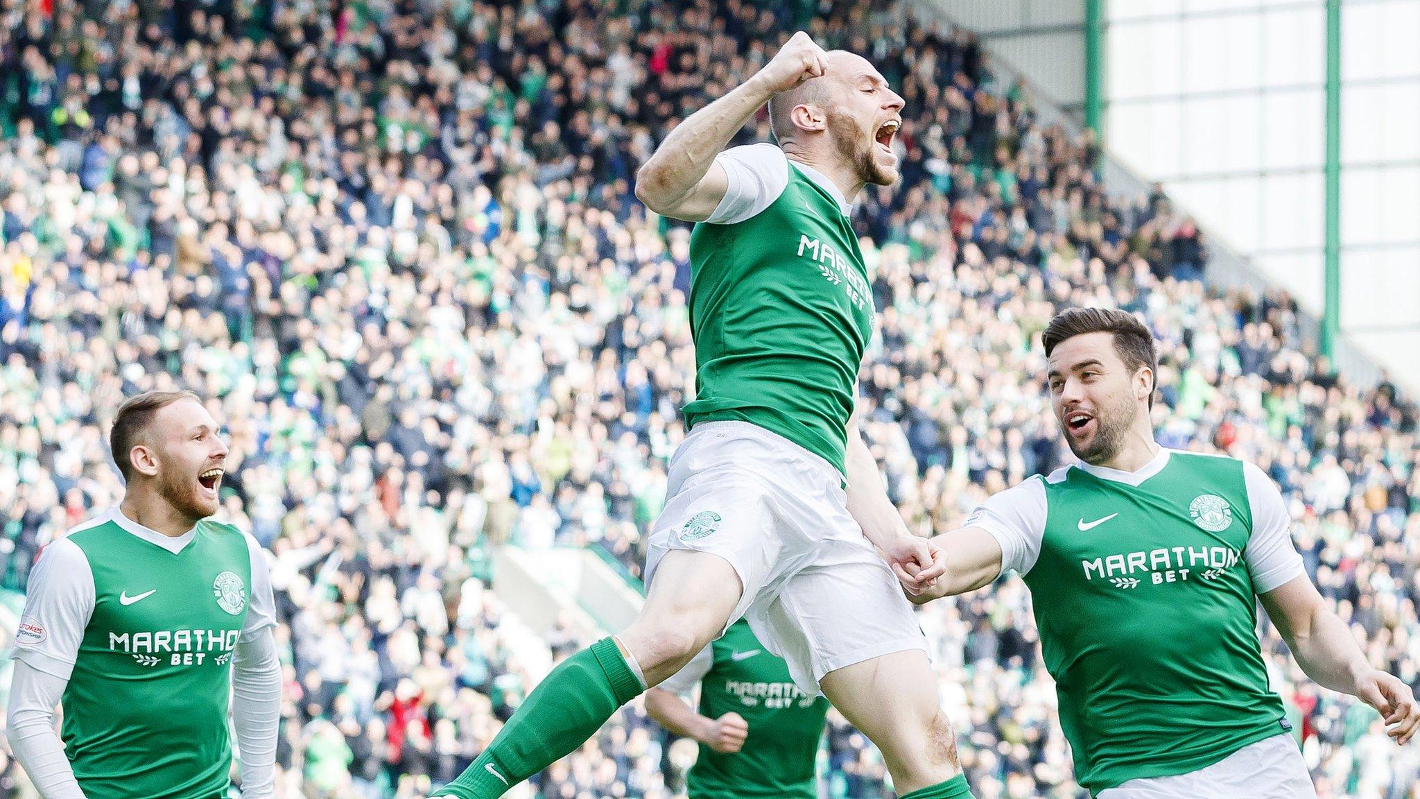 Hibs skipper David Gray celebrates making it 3-0 to Hibernian