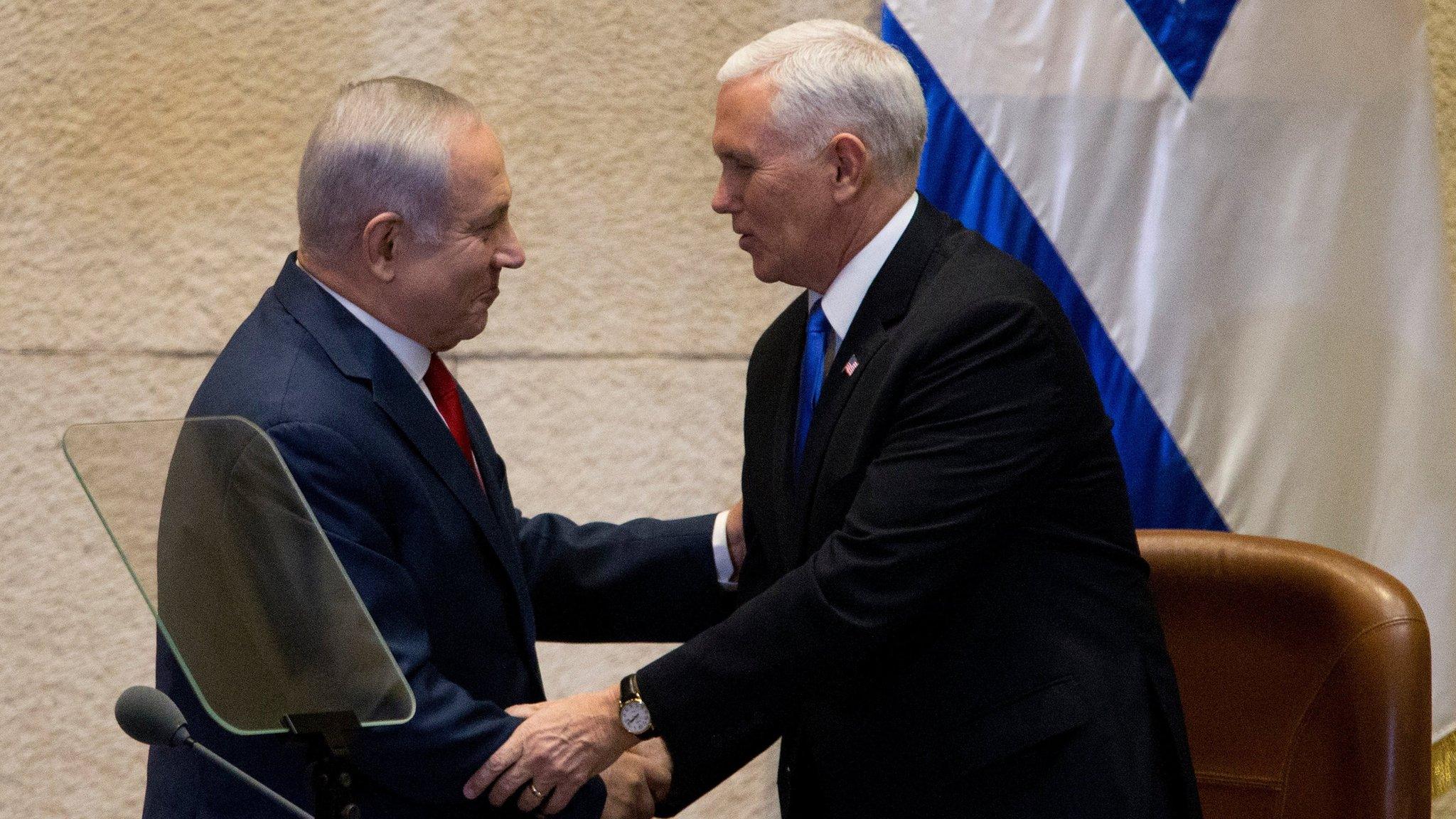 Israeli Prime Minister Benjamin Netanyahu shakes hands with US Vice-President Mike Pence in Jerusalem (22 January 2018)