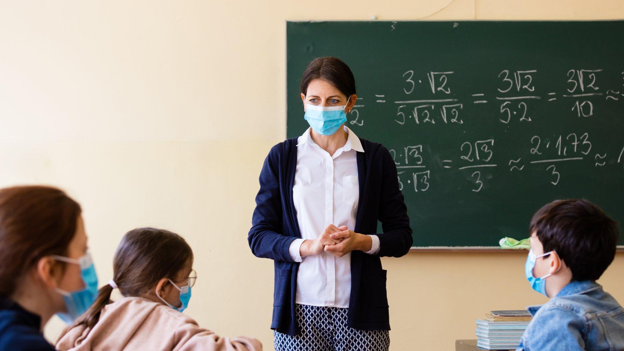 teacher class in mask