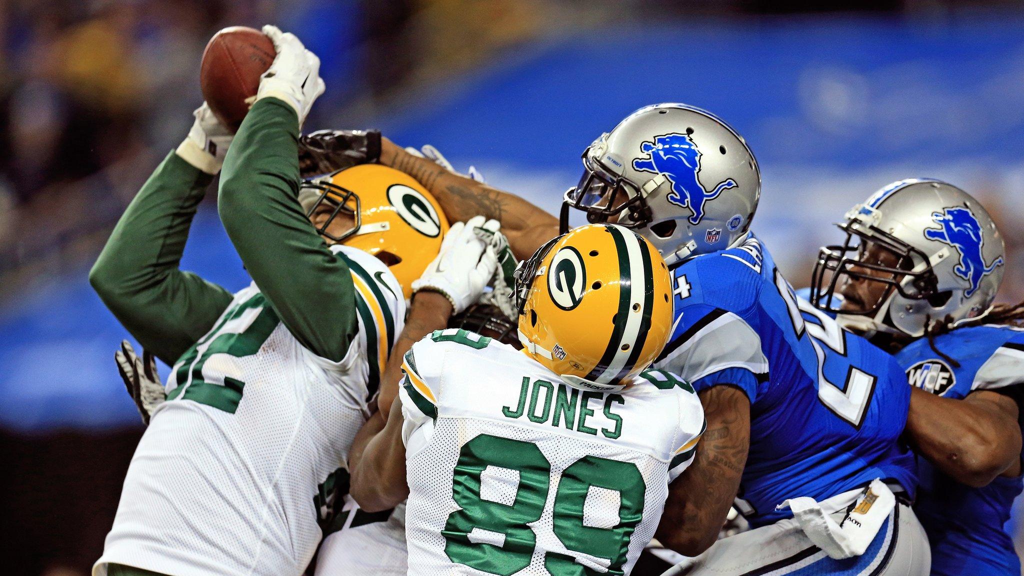 Tight end Richard Rodgers of the Green Bay Packers catches the game-winning touchdown at Detroit