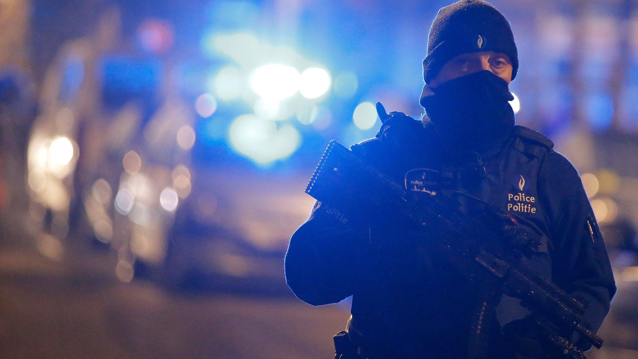 Belgian police officer in Schaerbeek following Tuesday's bomb attacks in Brussels. March 25, 2016