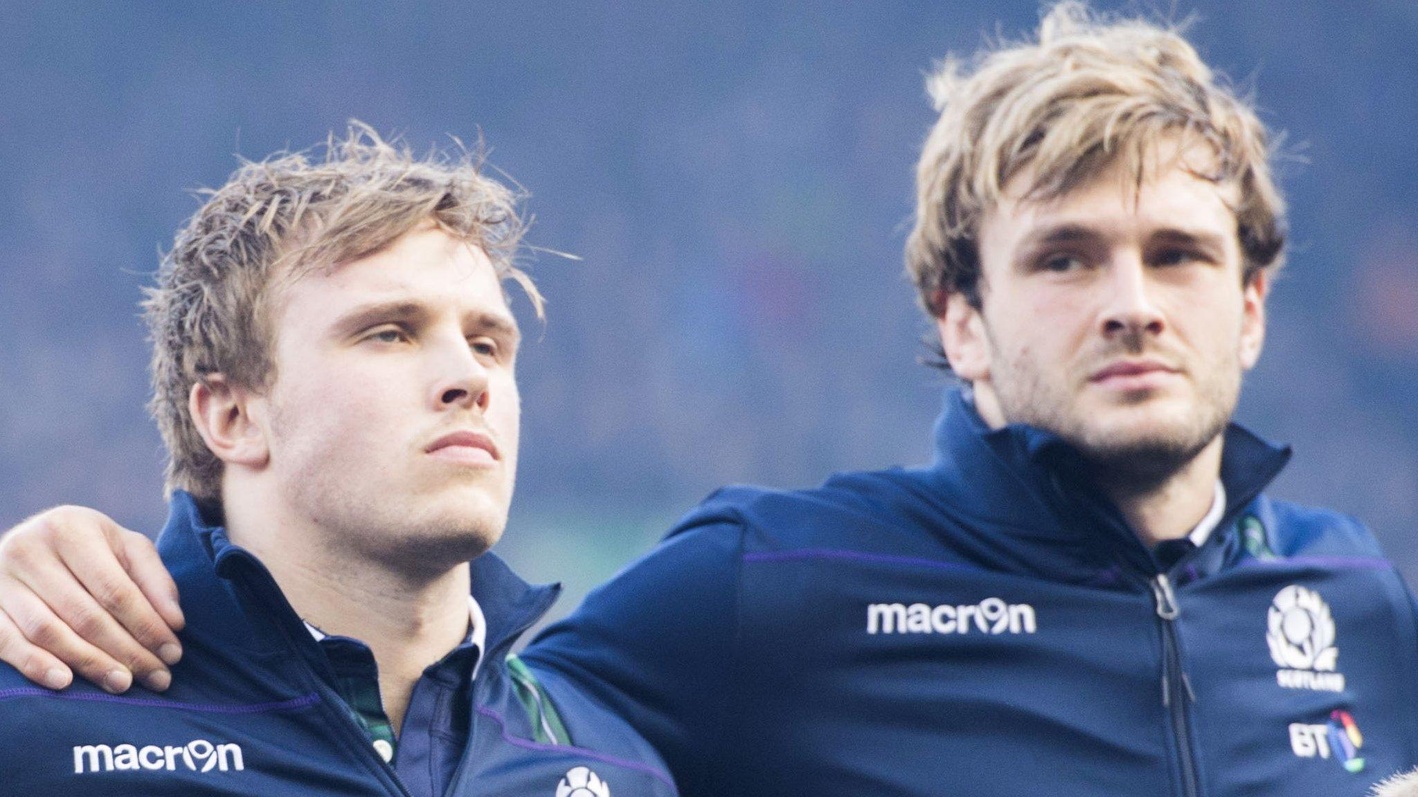 Jonny Gray and Richie Gray line up for the Scotland anthem before their Six Nations match against Wales