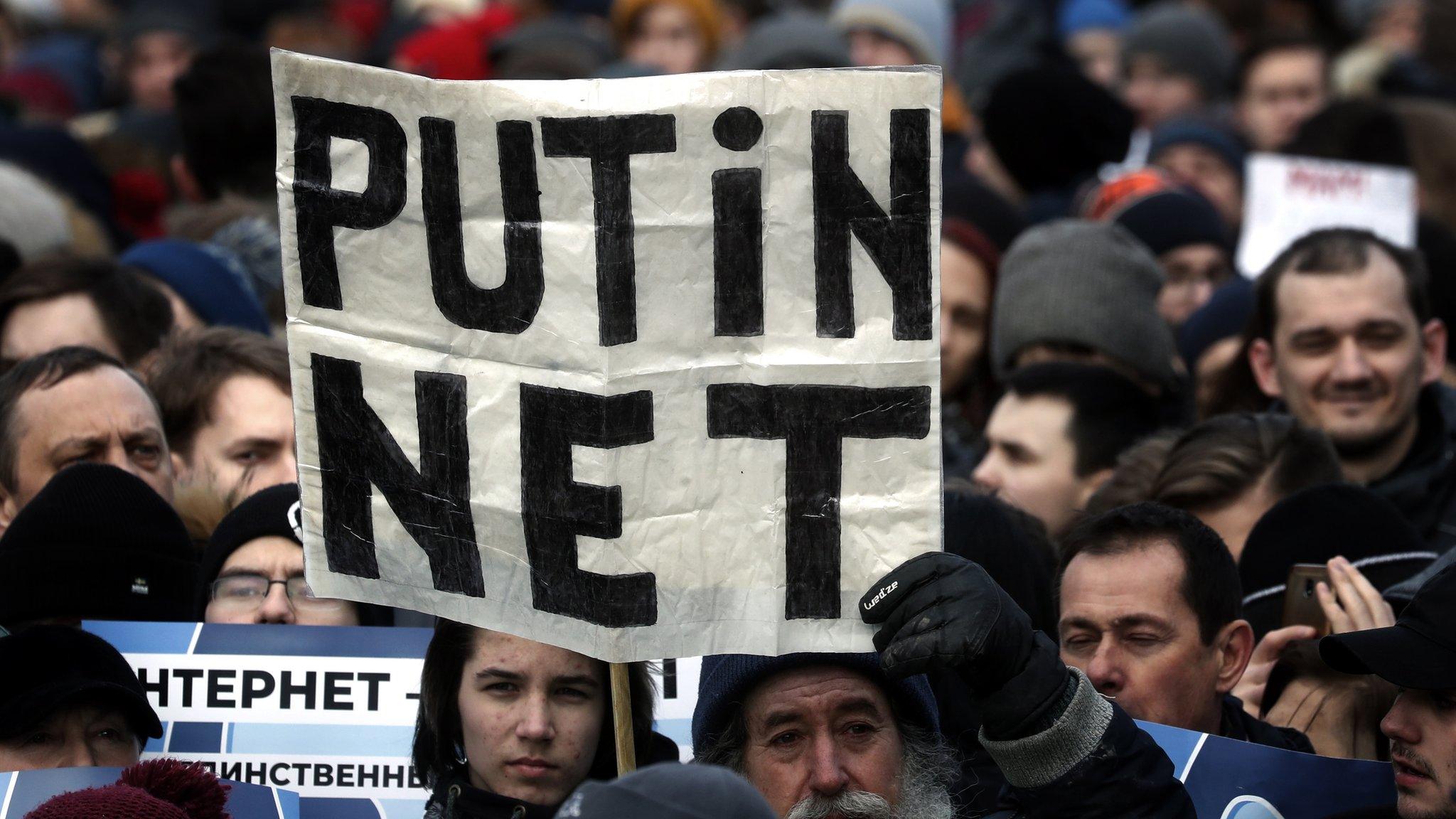 People attend an opposition rally in Moscow, Russia 10 March 2019