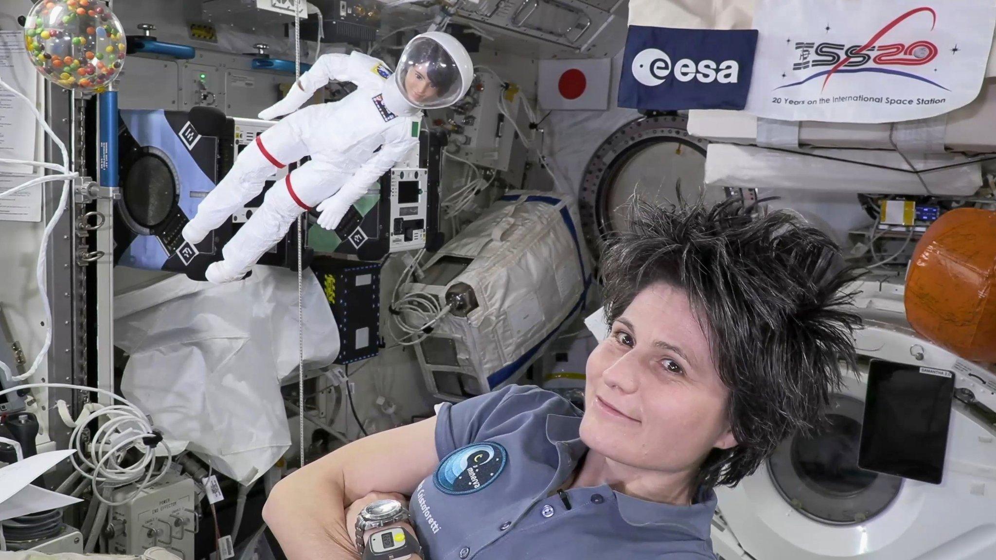 Samantha Cristoforetti and her barbie doll in the ISS