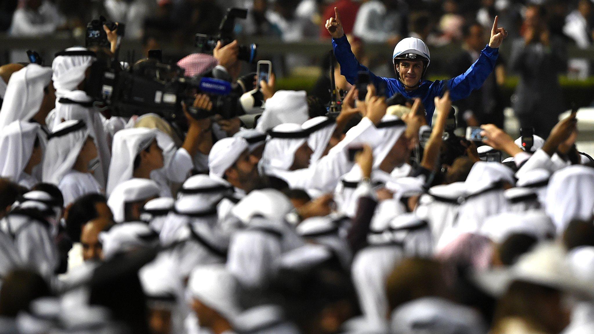 Christophe Soumillon riding Thunder Snow celebrates winning Dubai World Cup race during the Dubai World Cup Race Day at Meydan Racecourse on March 31, 2018 in Dubai, United Arab Emirates.