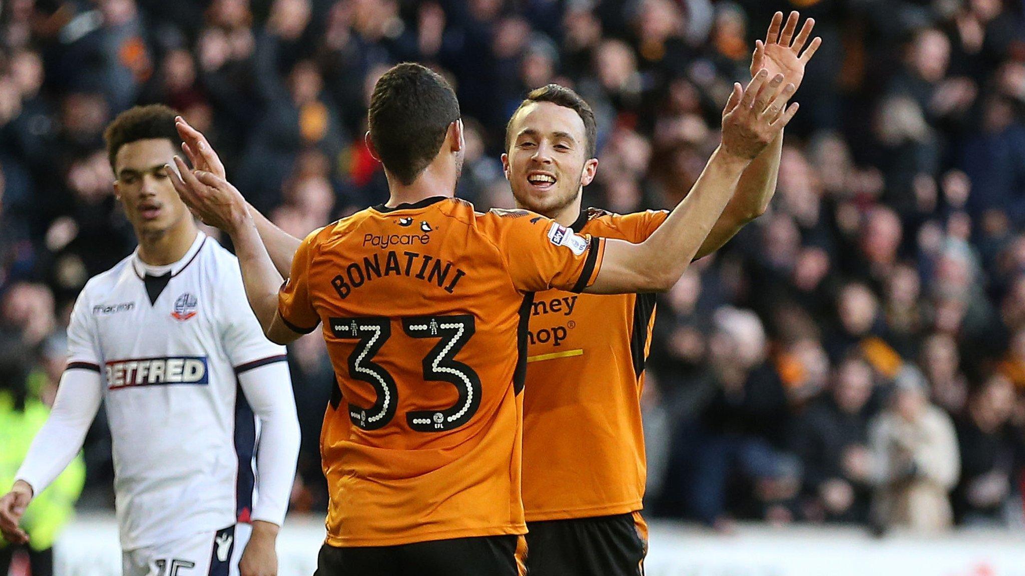 Wolves scorer Leo Bonatini celebrated his side's second goal with the architect, Diogo Jota