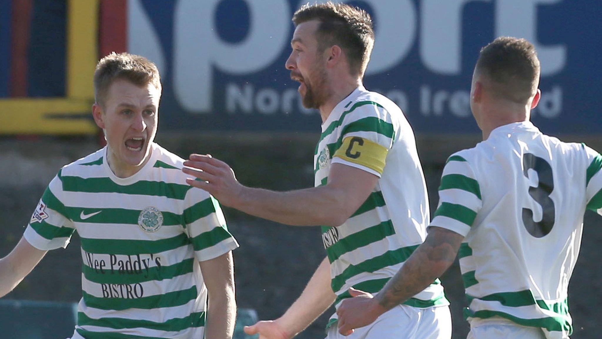 Lurgan Celtic's Aaron Haire (left) celebrates scoring the opener at Shamrock Park