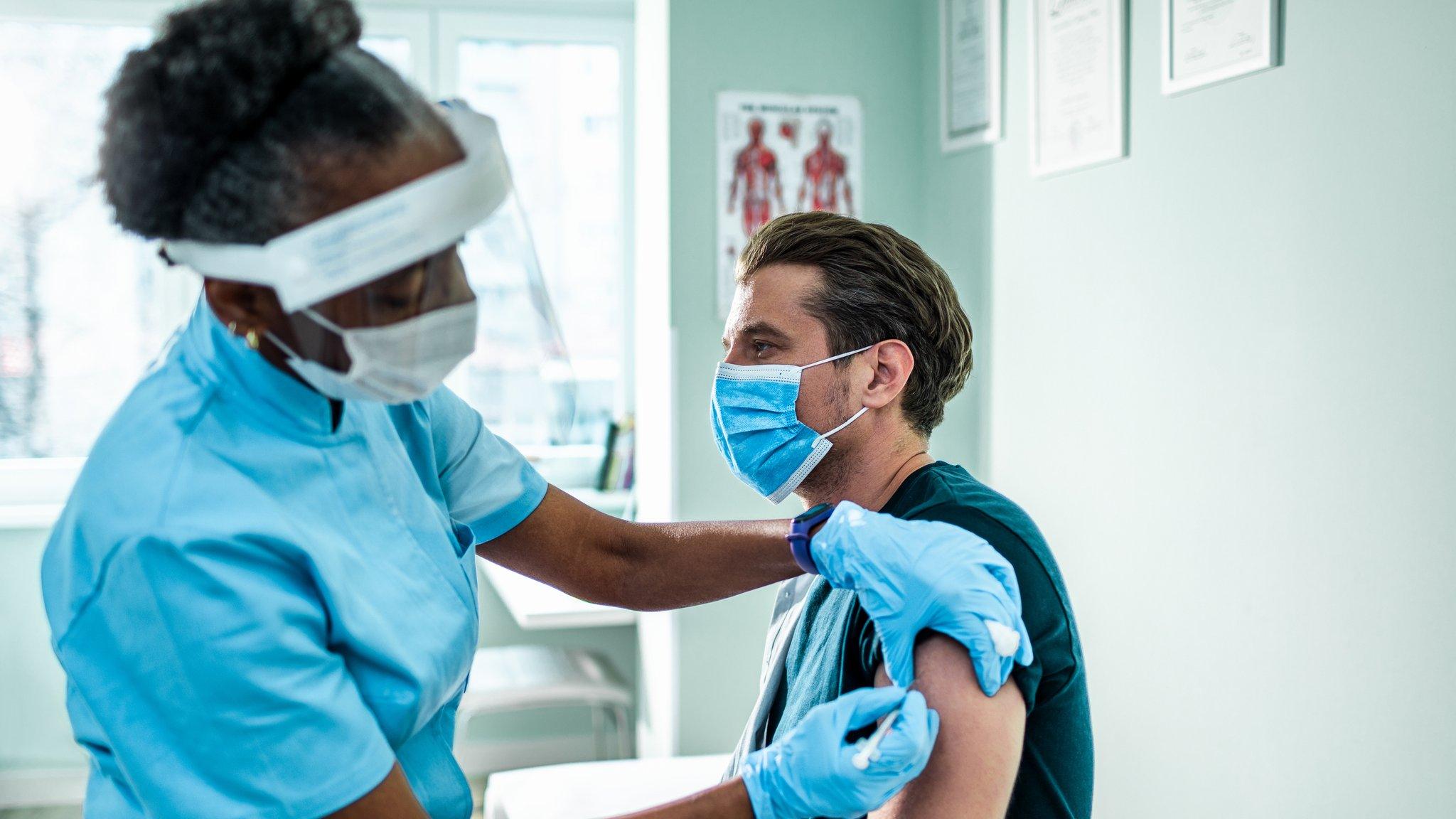 picture of person getting a vaccine