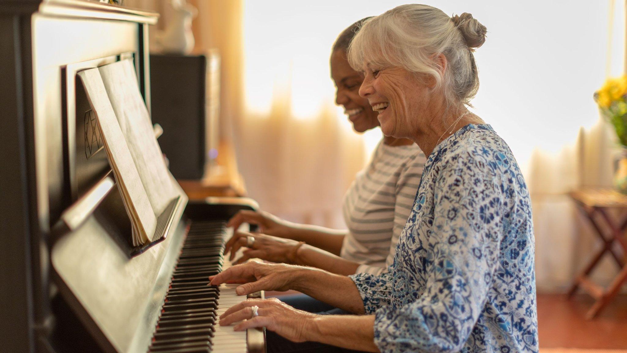 Women playing piano