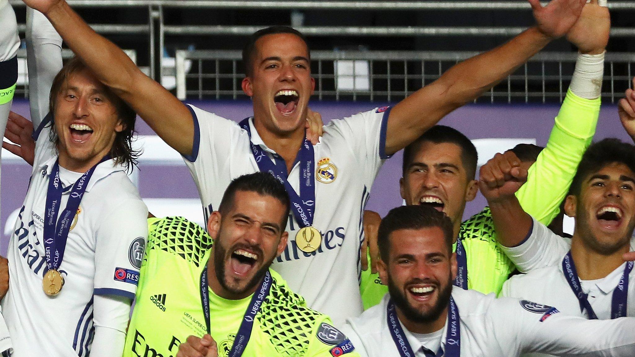 Real Madrid's players celebrate winning the 2016 Super Cup