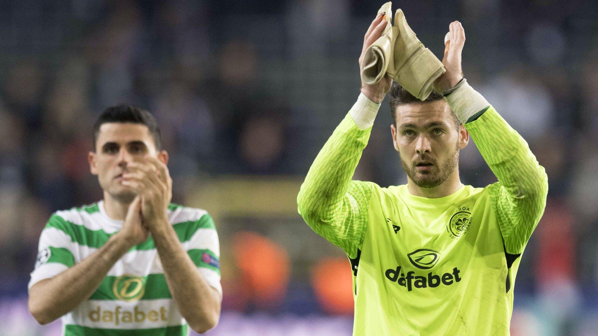 Tom Rogic and Craig Gordon applaud the Celtic fans