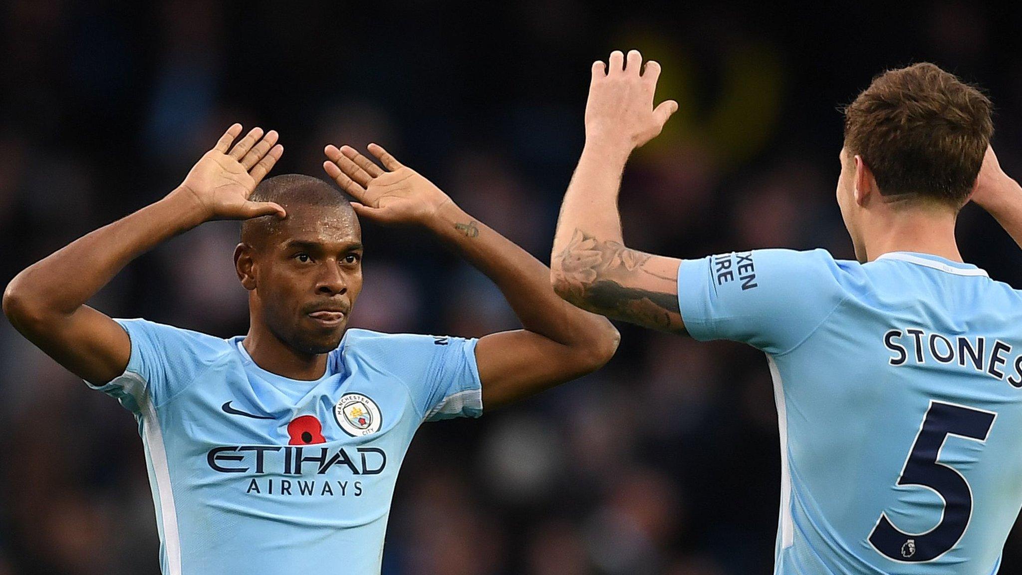 Fernandinho and John Stones