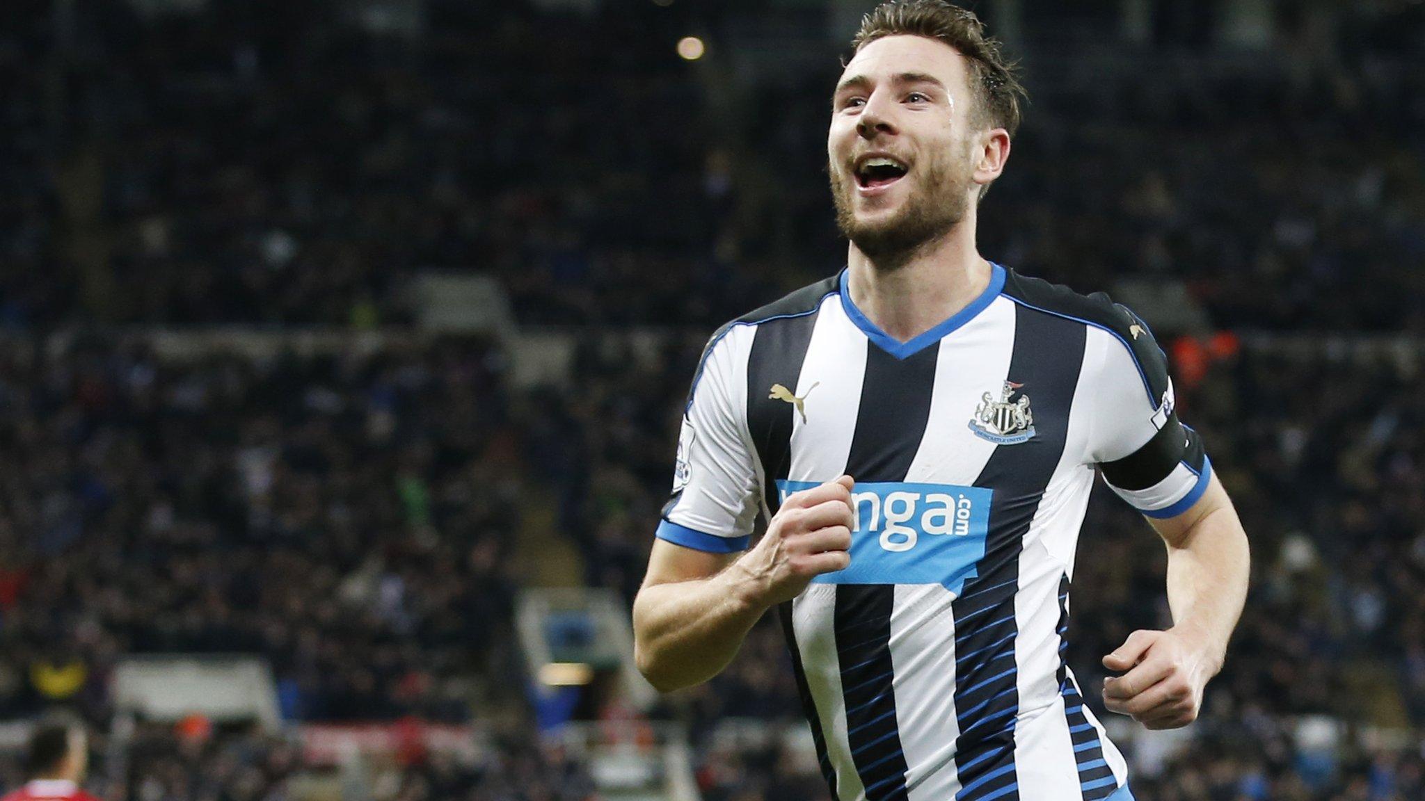 Paul Dummett celebrates