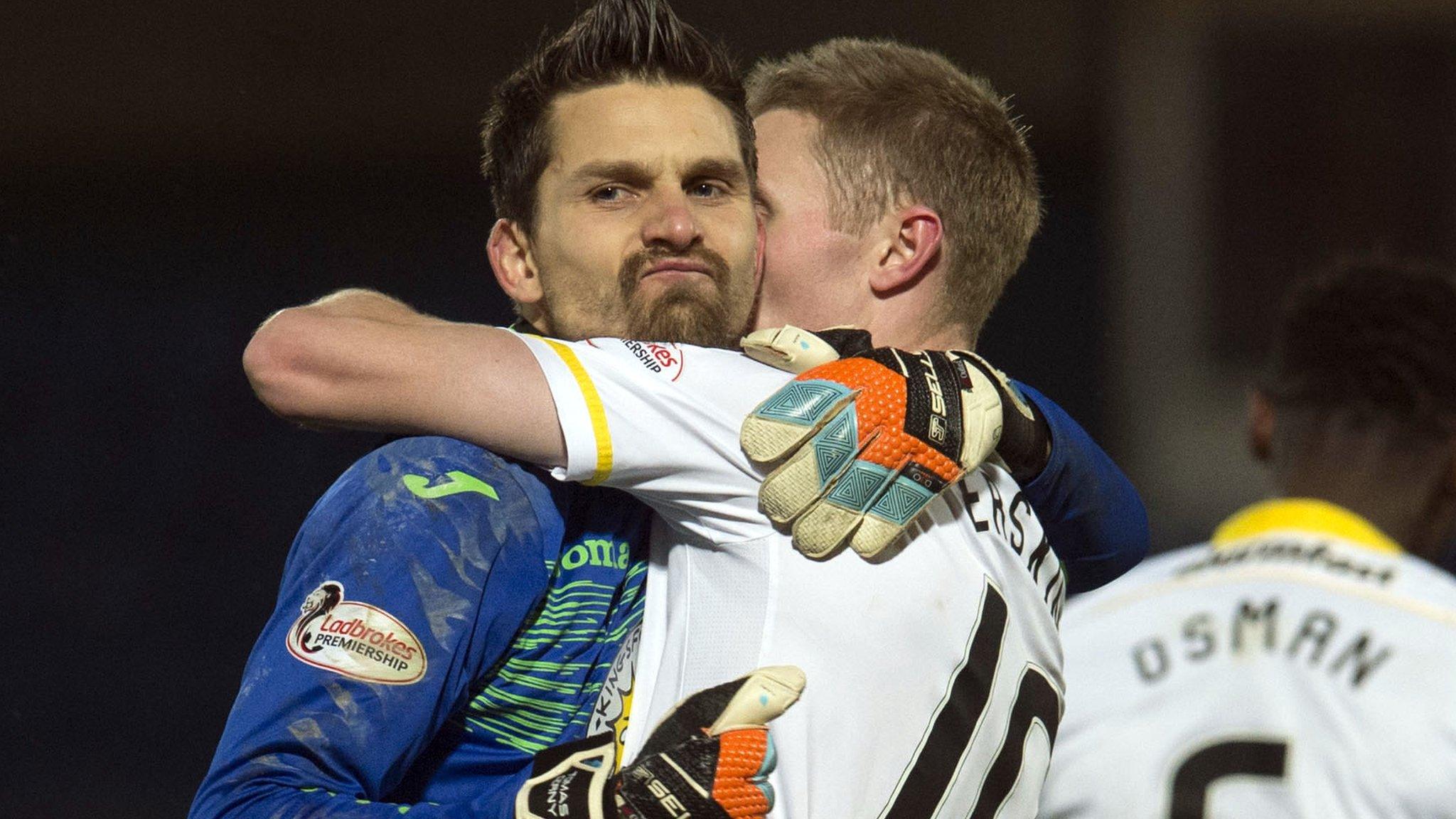 Partick goalkeeper Tomas Cerny and goalscorer Chris Erskine celebrate victory