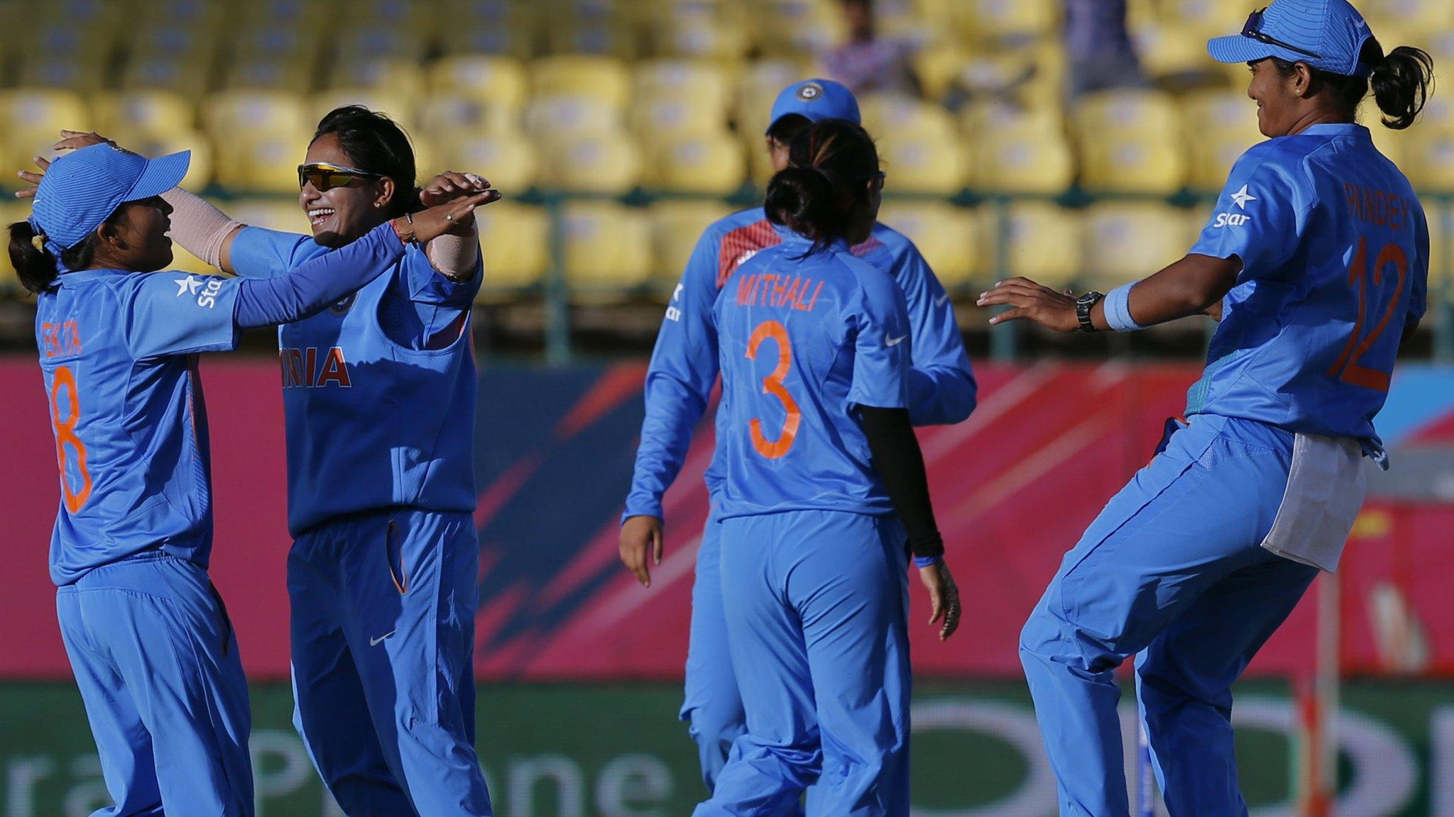 India celebrate taking a wicket