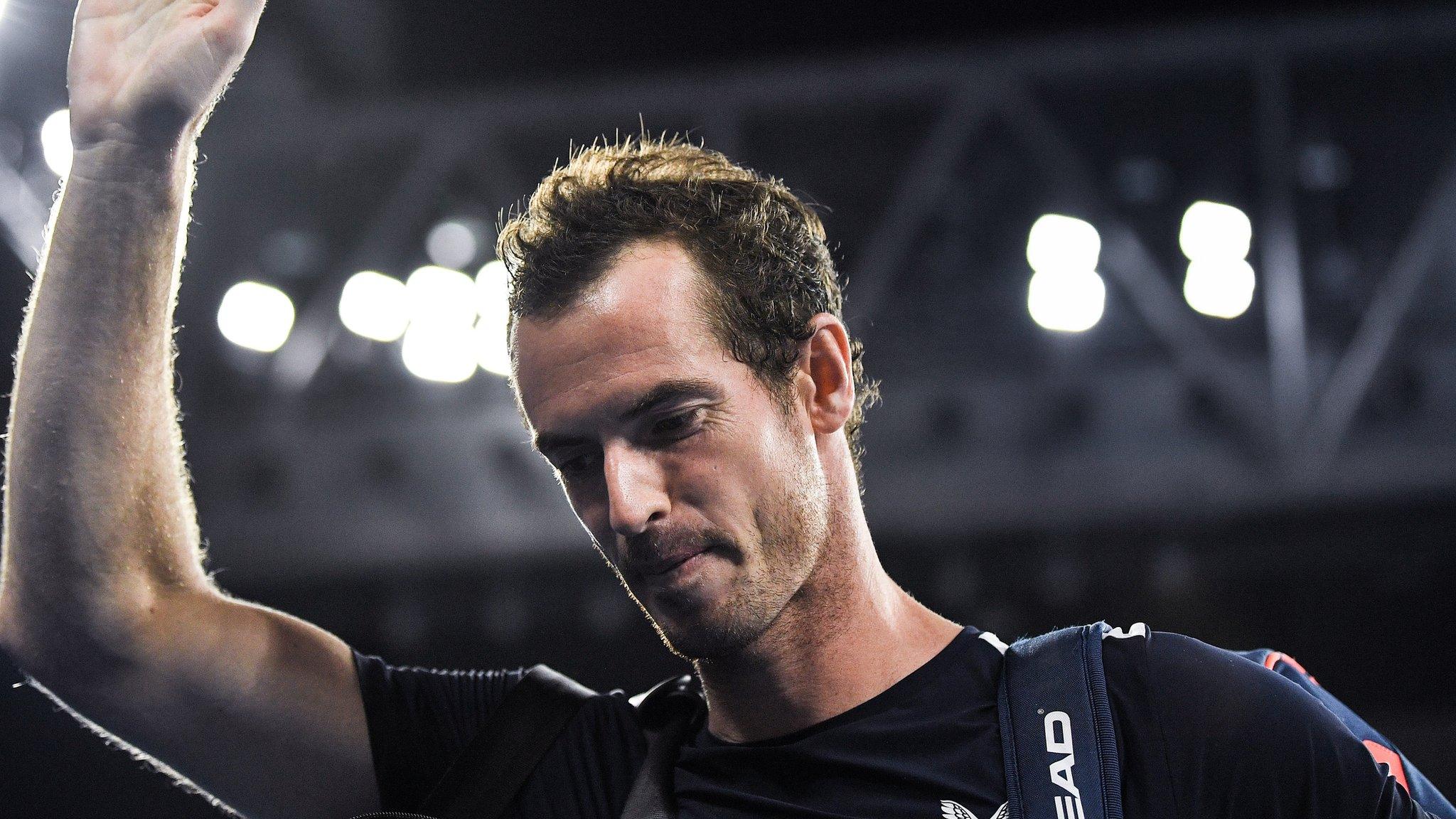 Andy Murray waves to the crowd after losing to Roberto Bautista Agut