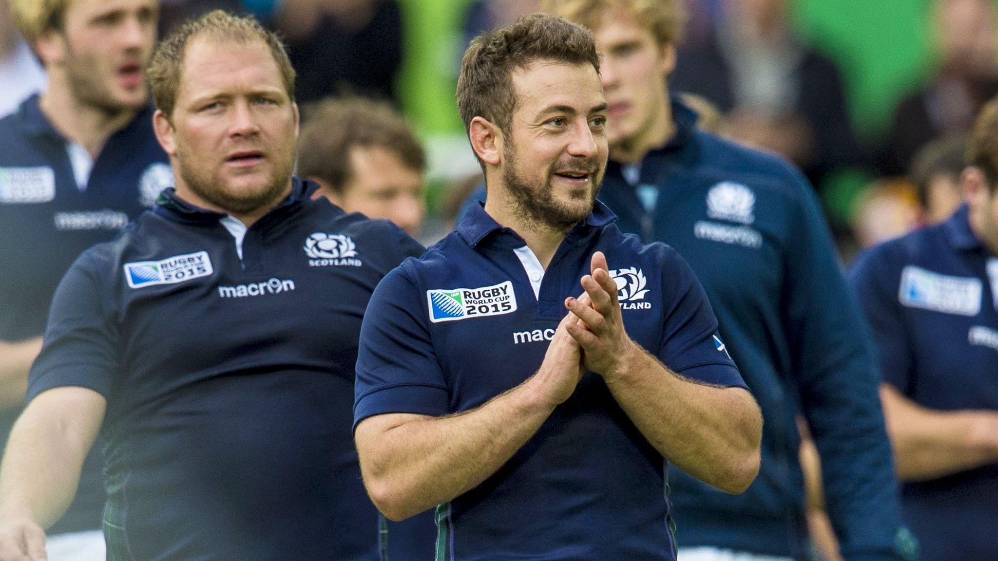 Greig Laidlaw leads the Scotland team round the pitch as the fans applaud their win over Samoa