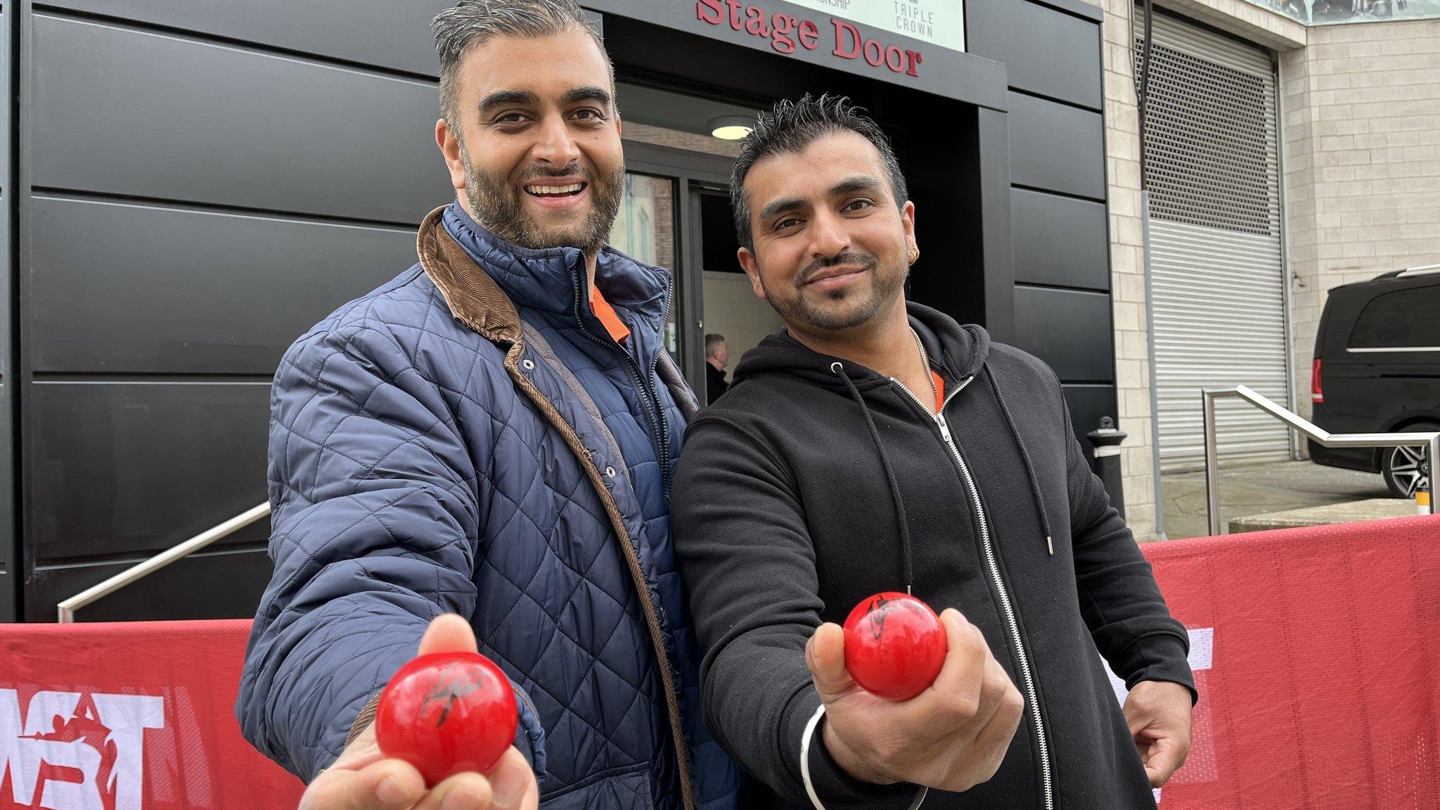 Two fans outside Crucible