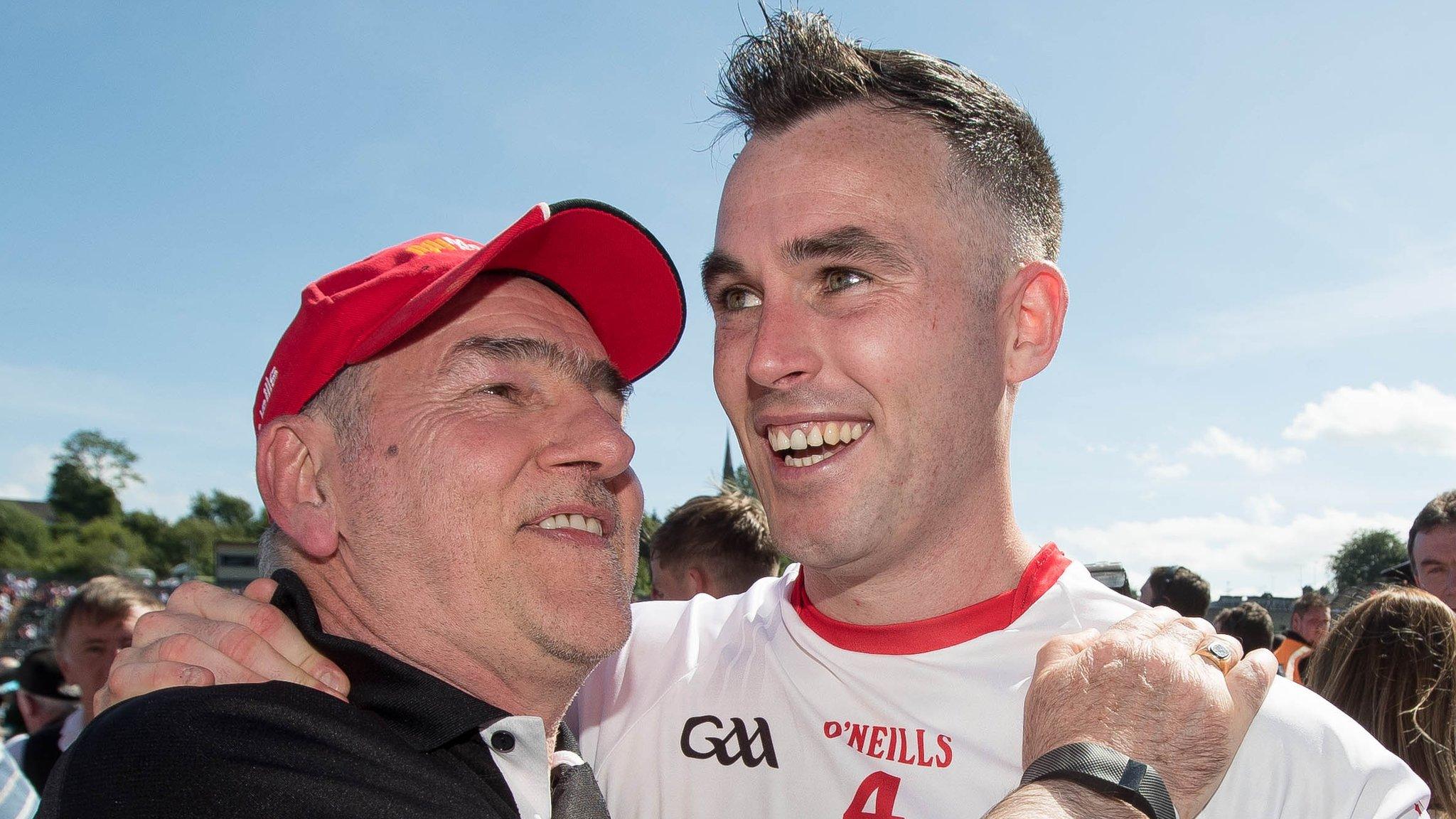 Mickey Harte celebrates with Cathal McCarron after Tyrone's Ulster SFC triumph last year