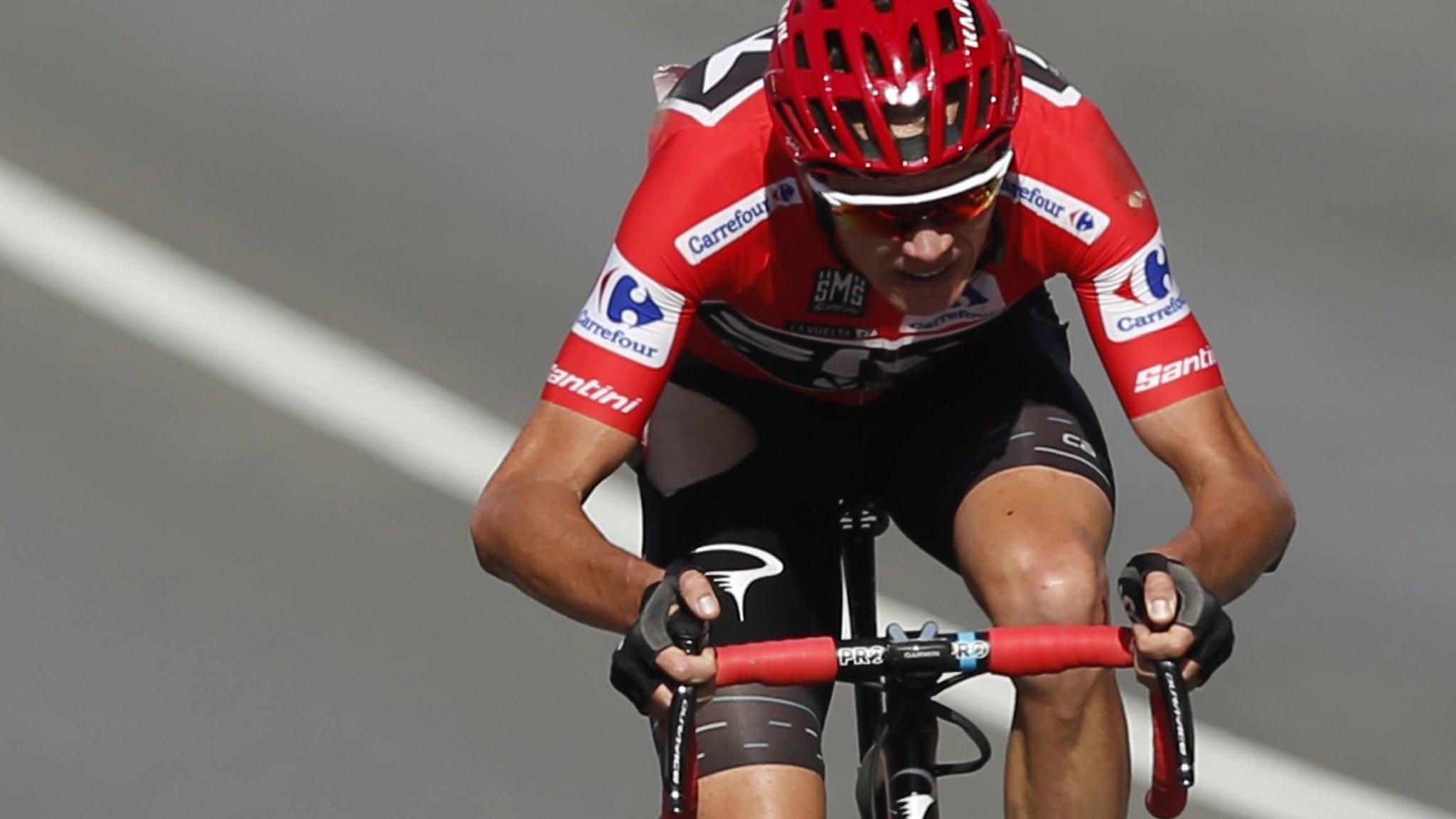 Chris Froome drives to the finishing line on stage 12