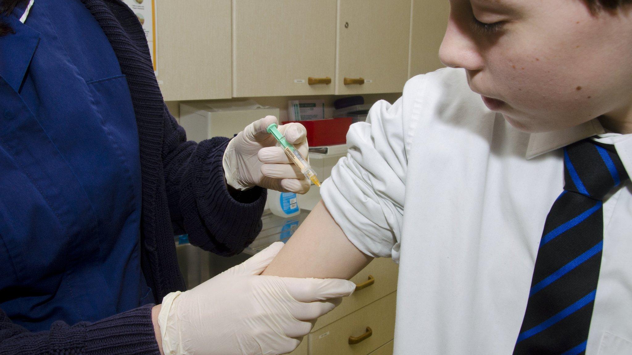 Human Papilloma Virus (HPV) vaccine being given to a boy