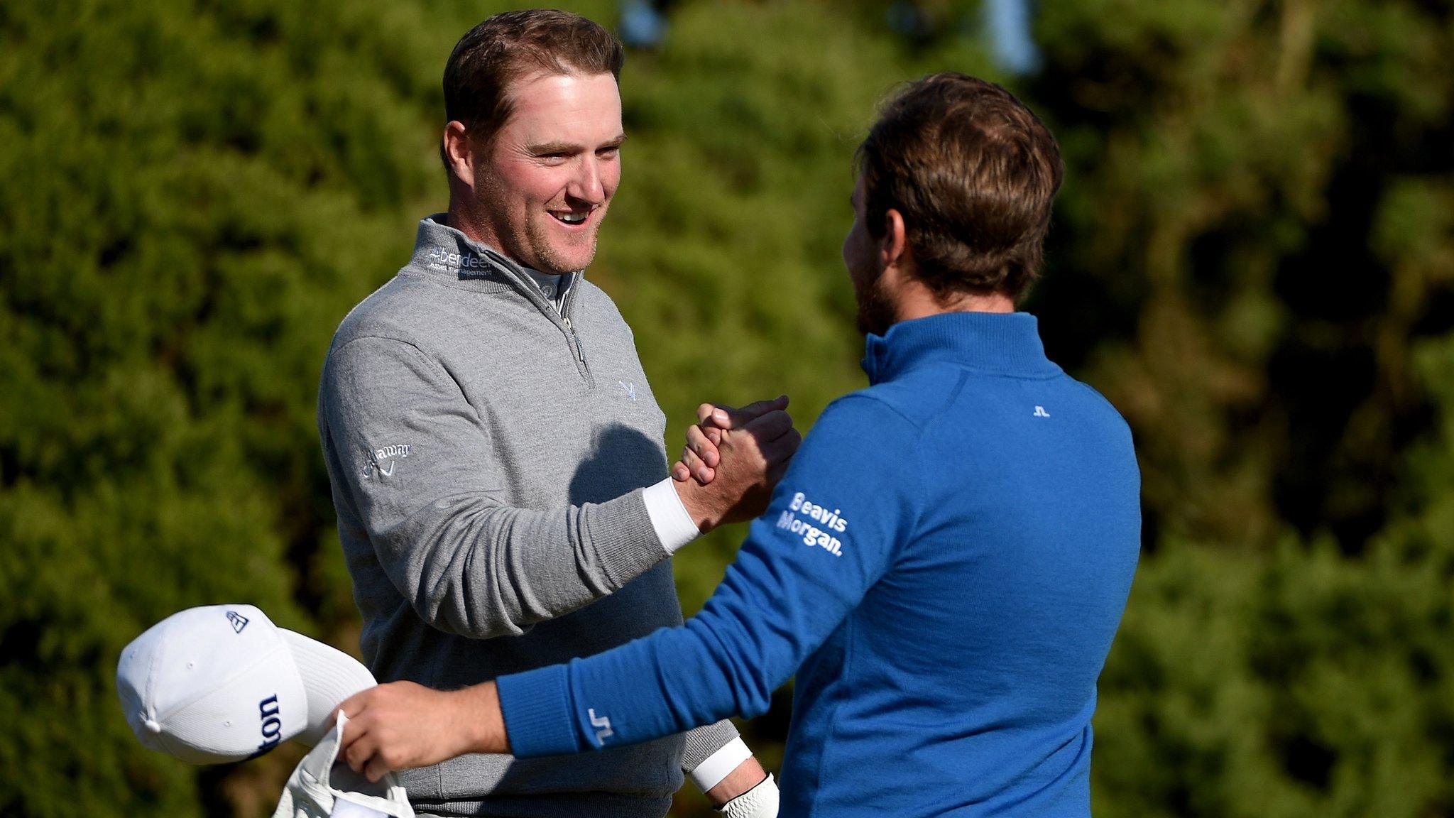 Marc Warren is congratulated by Tyrrell Hatton