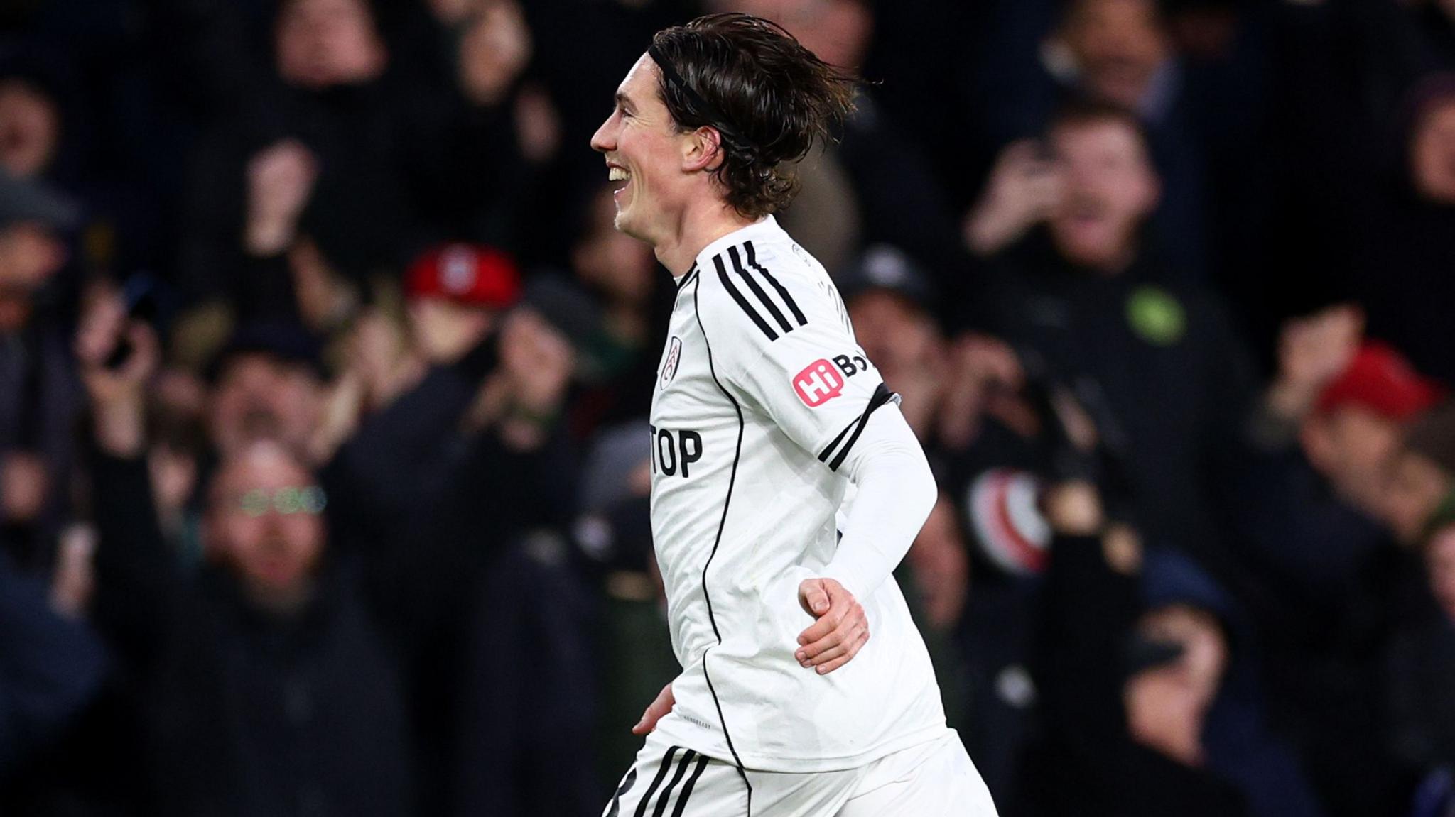 Harry Wilson of Fulham celebrates scoring his team's second goal 