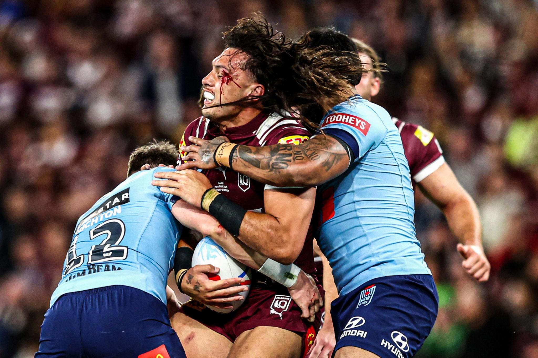 Maroons' Tino Fa'asuamaleaui charges forward during game one of the Men's State of Origin series at Suncorp Stadium in Brisbane, Australia. Photo by Chris Hyde