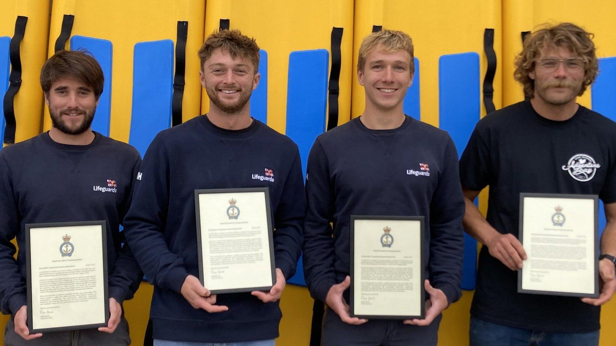 RNLI lifeguards receiving awards (L to R James Millidge, Beau Gillett, Ed Sampson, Tristan Gillett, Andy Wrennell, Charlie Gillett