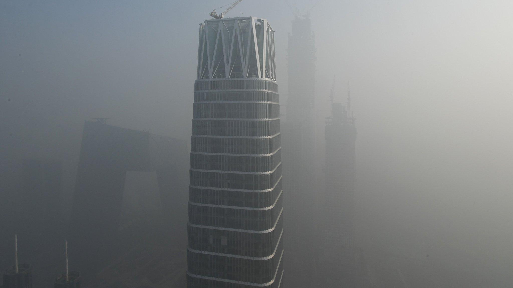 Buildings are seen on a polluted day in Beijing on 1 January, 2017