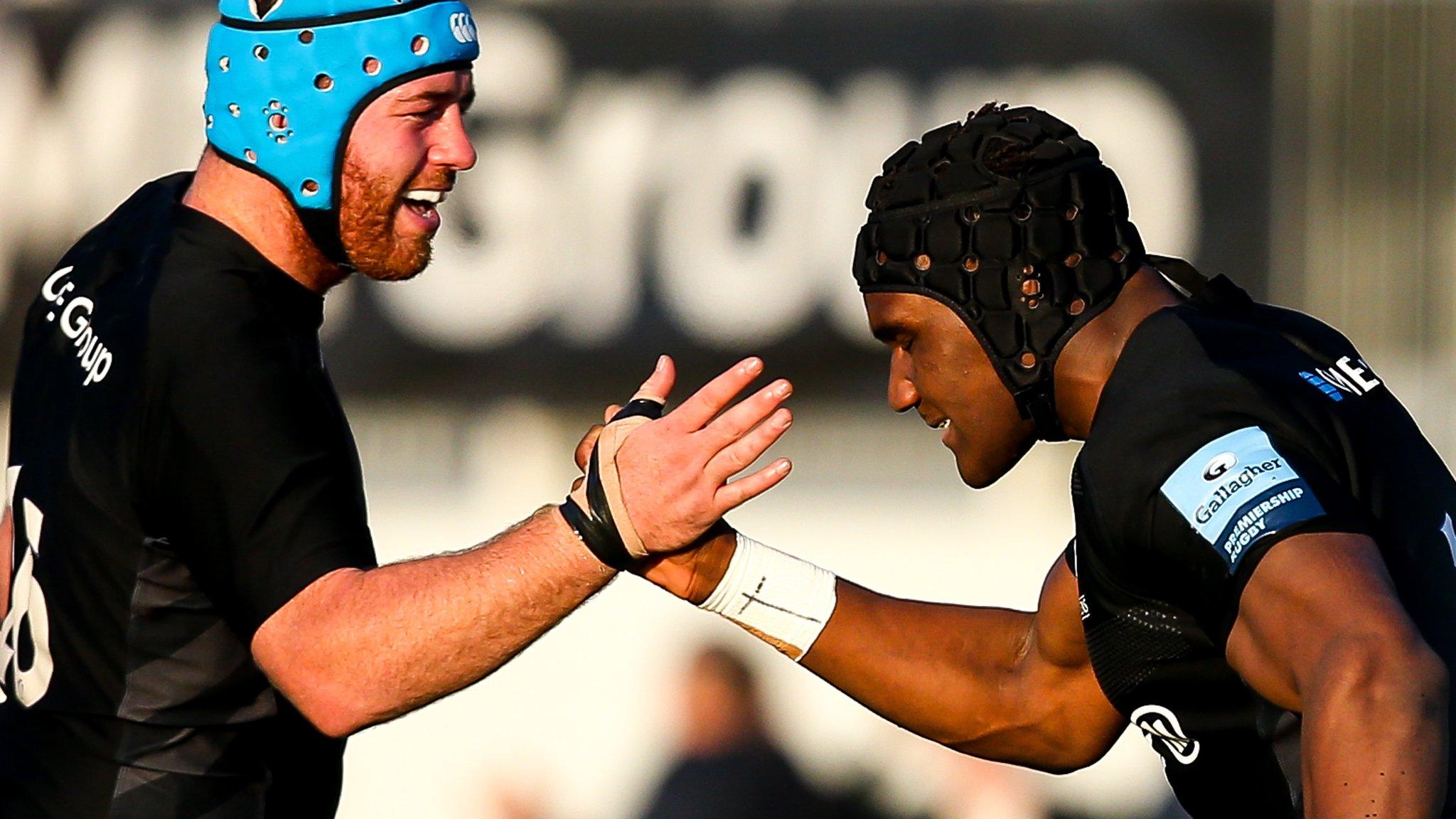 Joel Kpoku (right) celebrates his late try with Saracens teammate Joe Gray